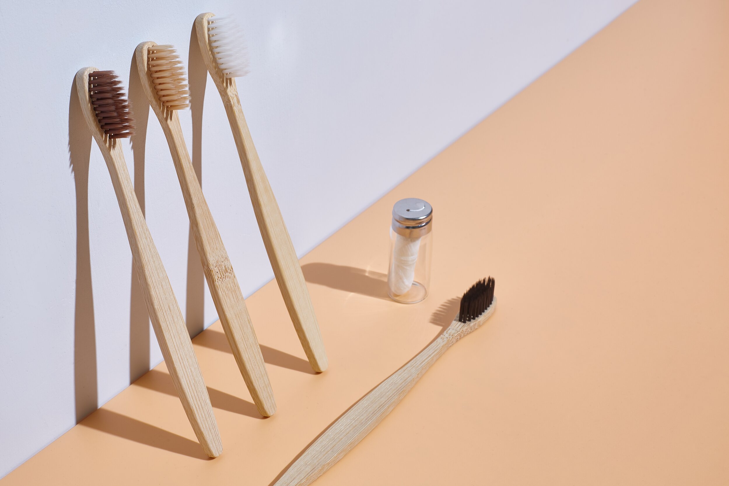 wooden-toothbrushes-with-dental-floss-the-concept-of-recycling-garbage-and-zero-waste-3d-light_t20_P0xoXR.jpg