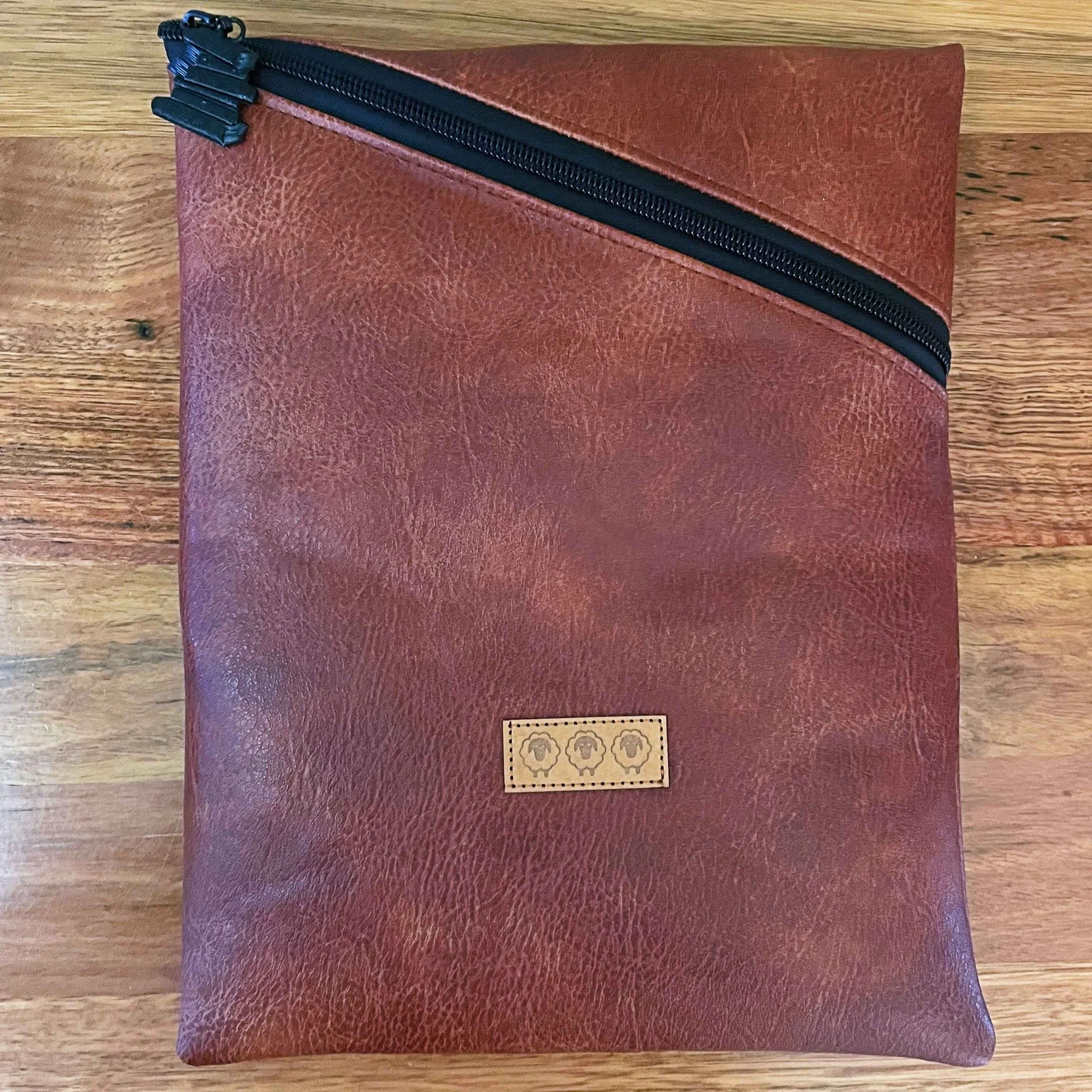 Gorgeous tan vinyl Book Sleeve
Yes Please!