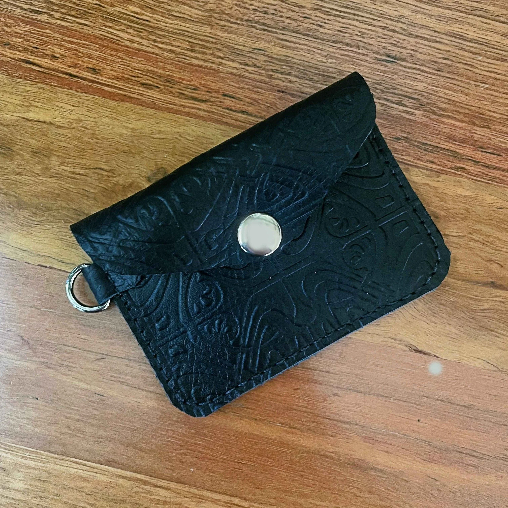 You know what the Embossed Leather Clutch needs? 
A matching coin purse