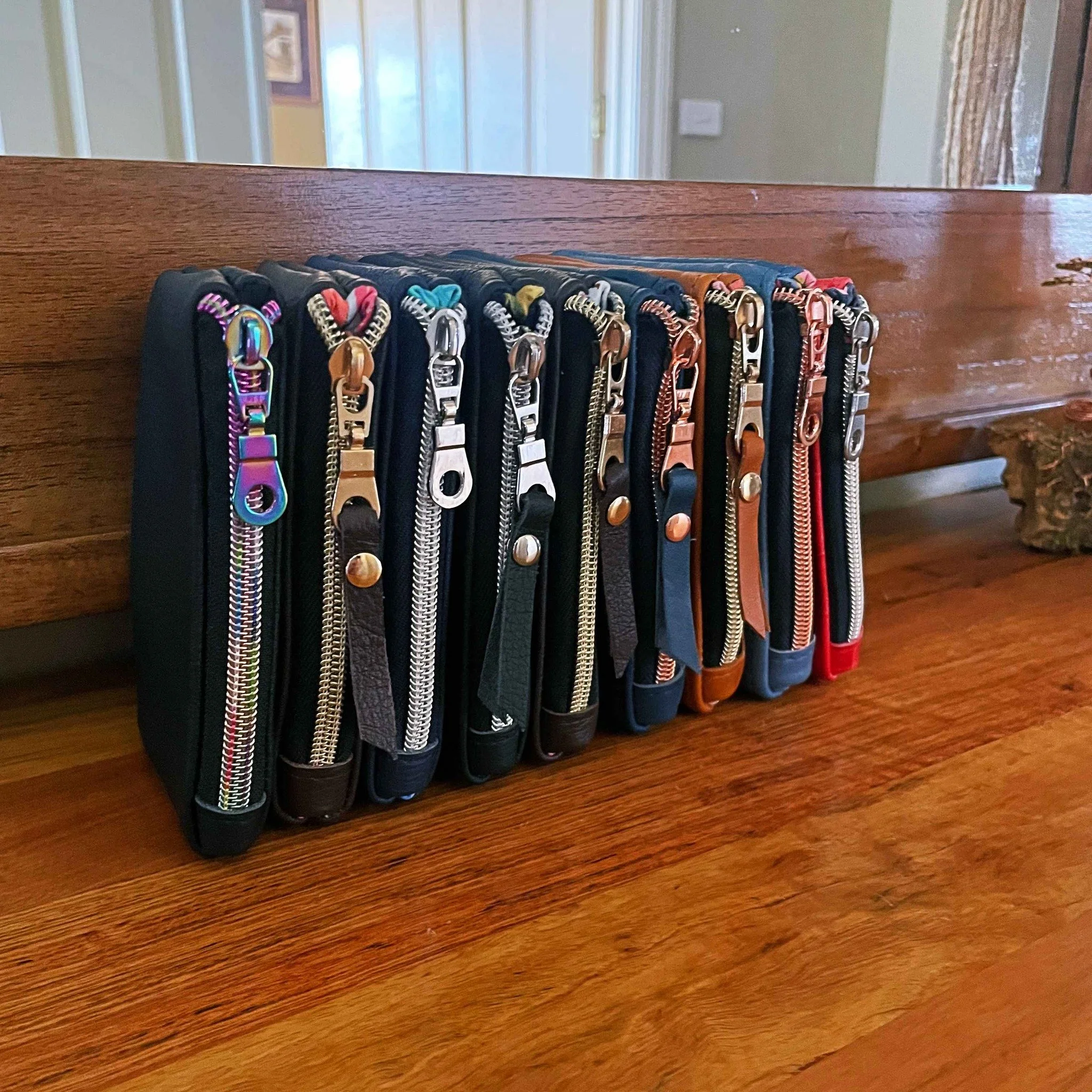 It's the little thing.
Small leather pouches fully  lined with 7 colours to choose from.