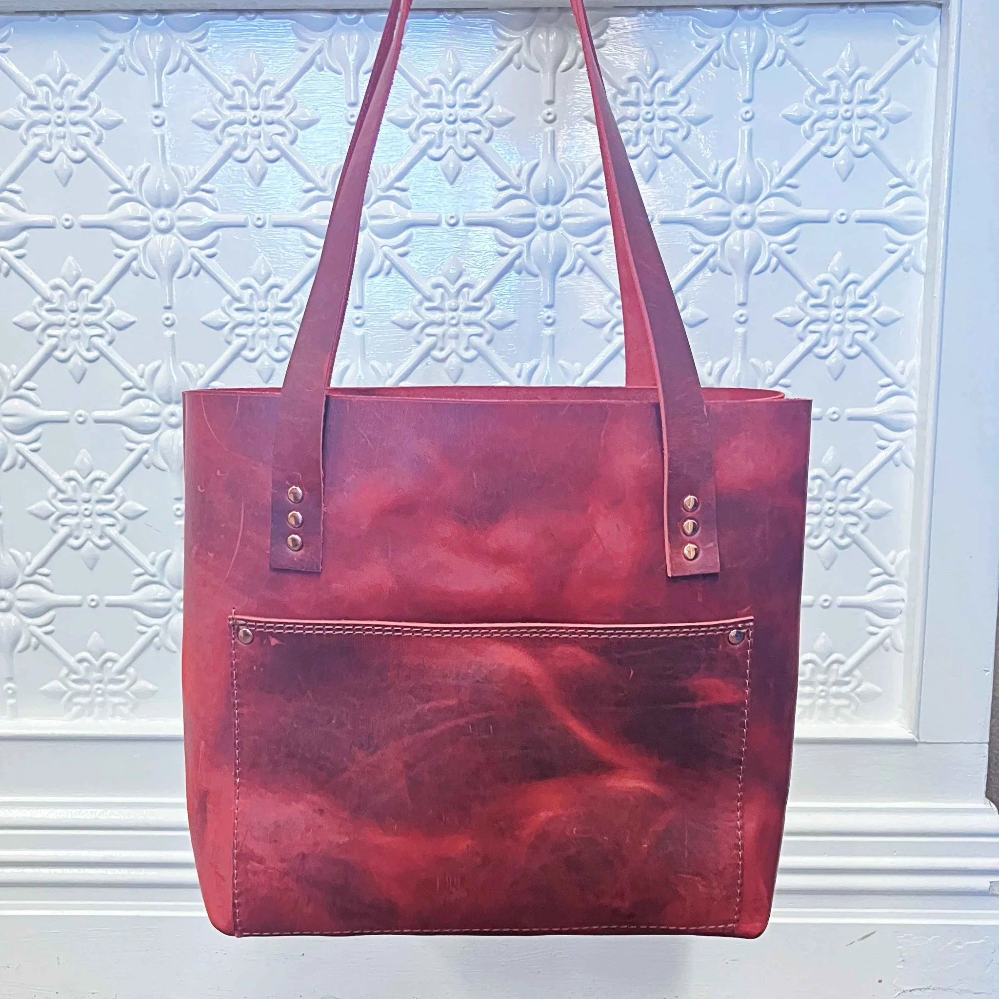 Think minimalist, natural, beauty. 
Now stop thinking of me and check out the bag 
Full grain raw  leather tote!