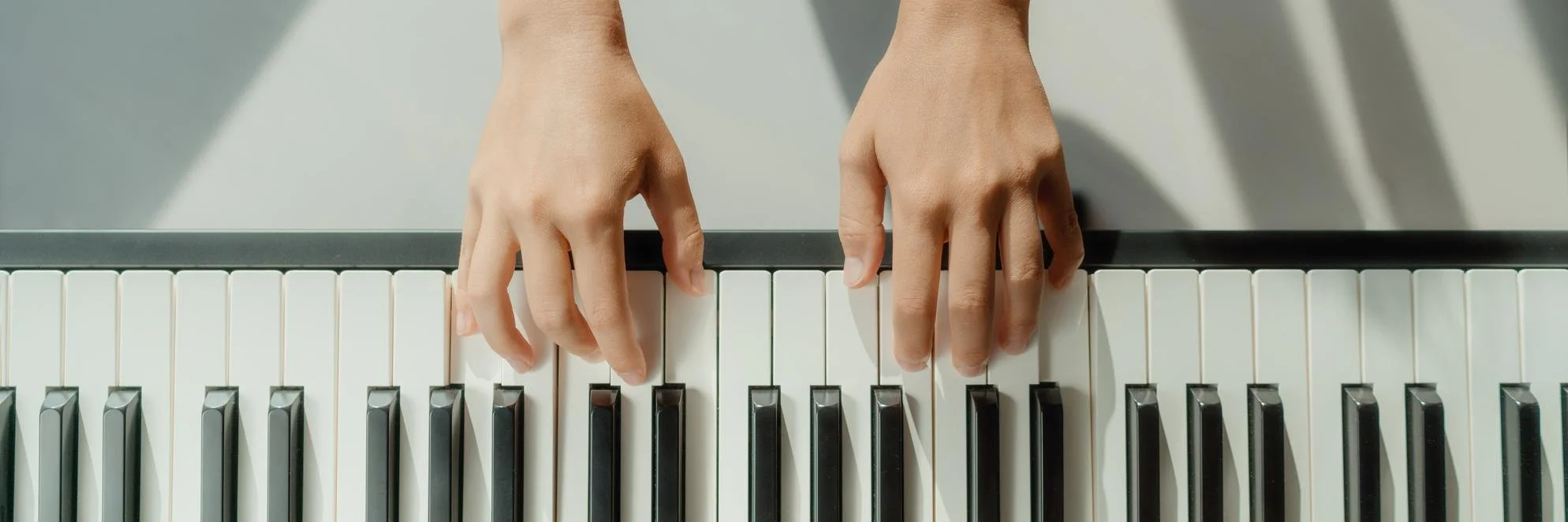 162330923-woman-learning-play-piano-home.jpeg
