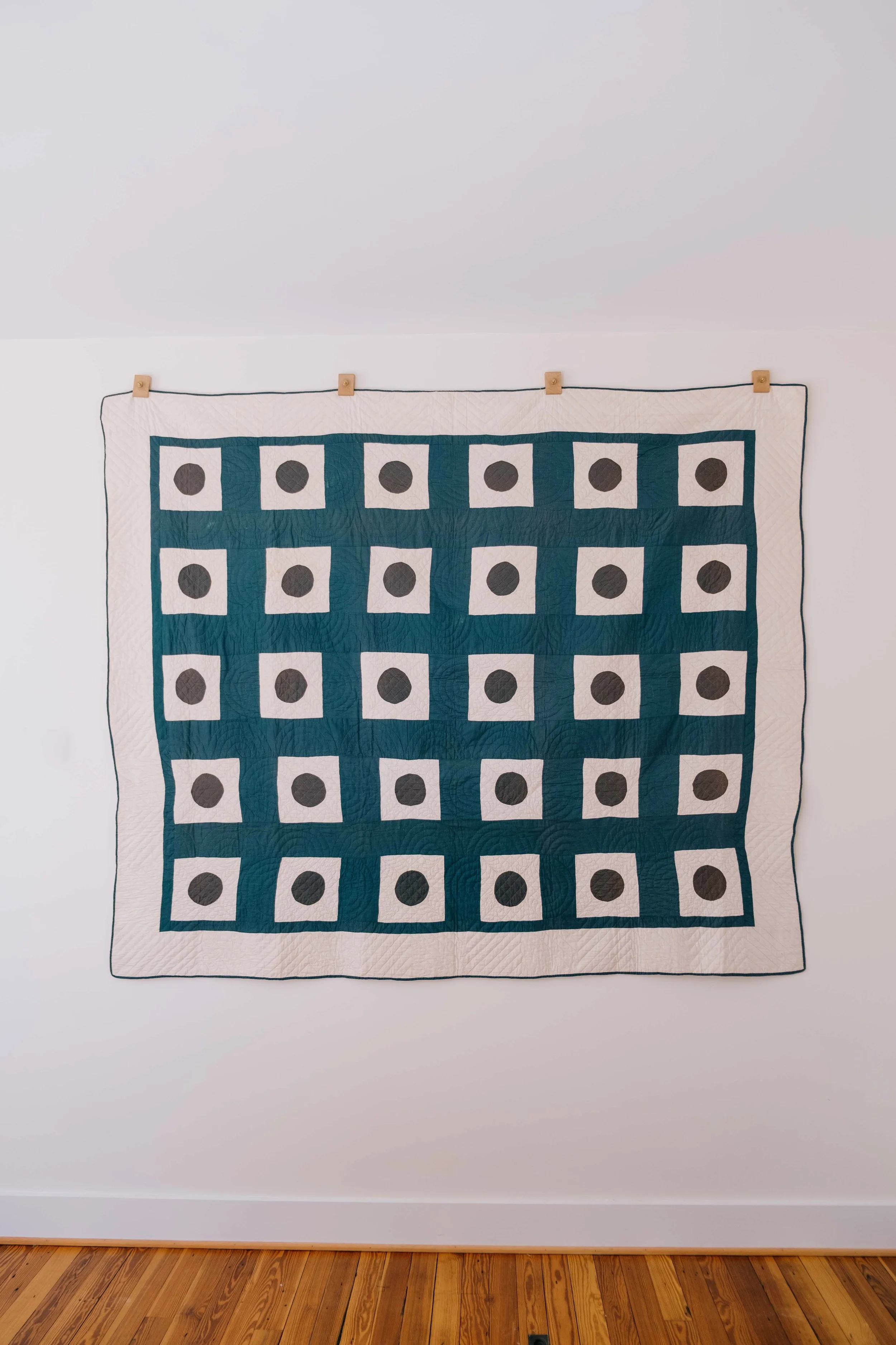Folkling-1900s-blue-dot-quilts.jpg
