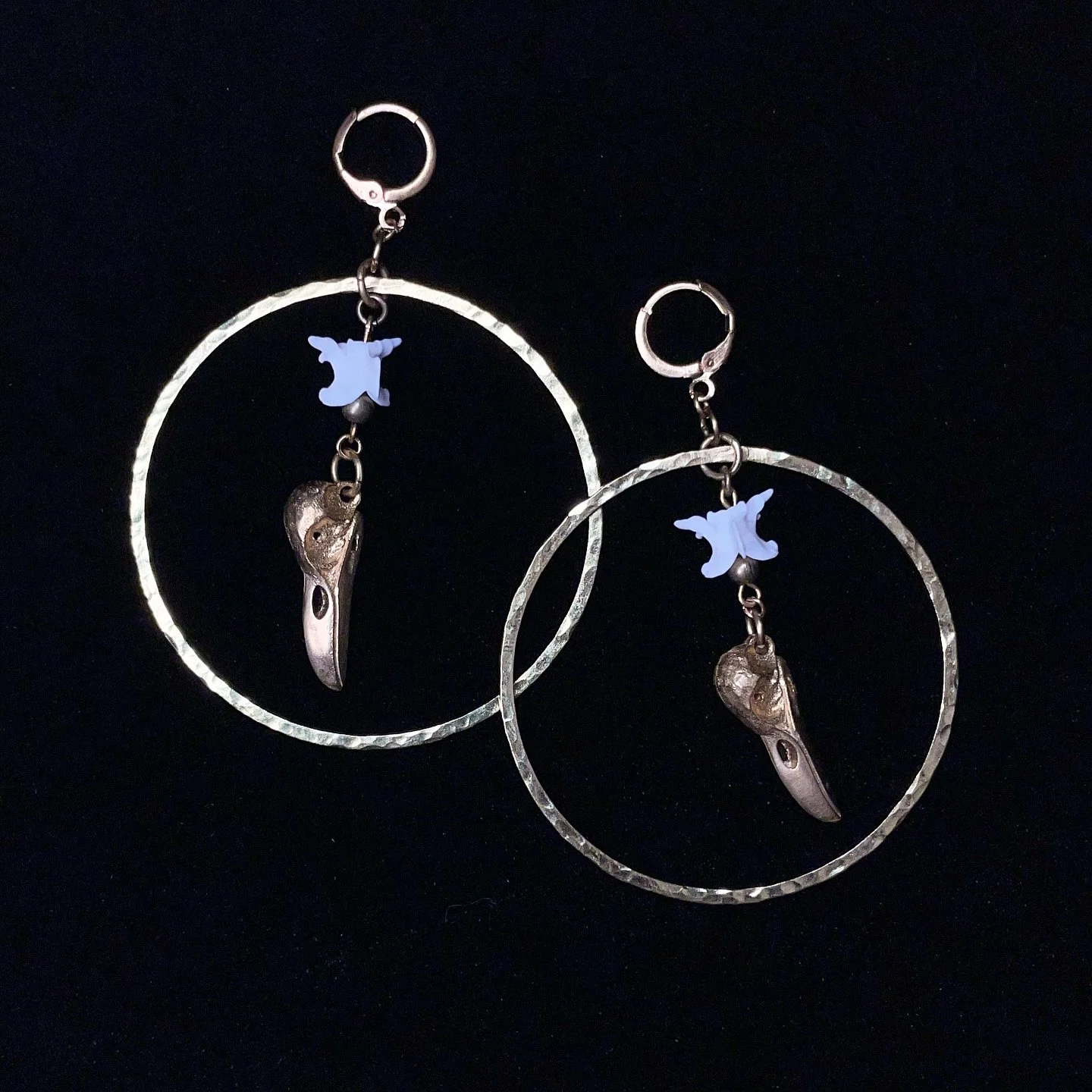 This pair of hammered raw brass hoops and raven skulls with real snake vertebrae (ethically sourced) will be available next weekend at the Calgary Tattoo Festival 🍭🖤 Come down and say hi 👋 I&rsquo;ll be selling at the @the.astoria.tattoo.co and @v