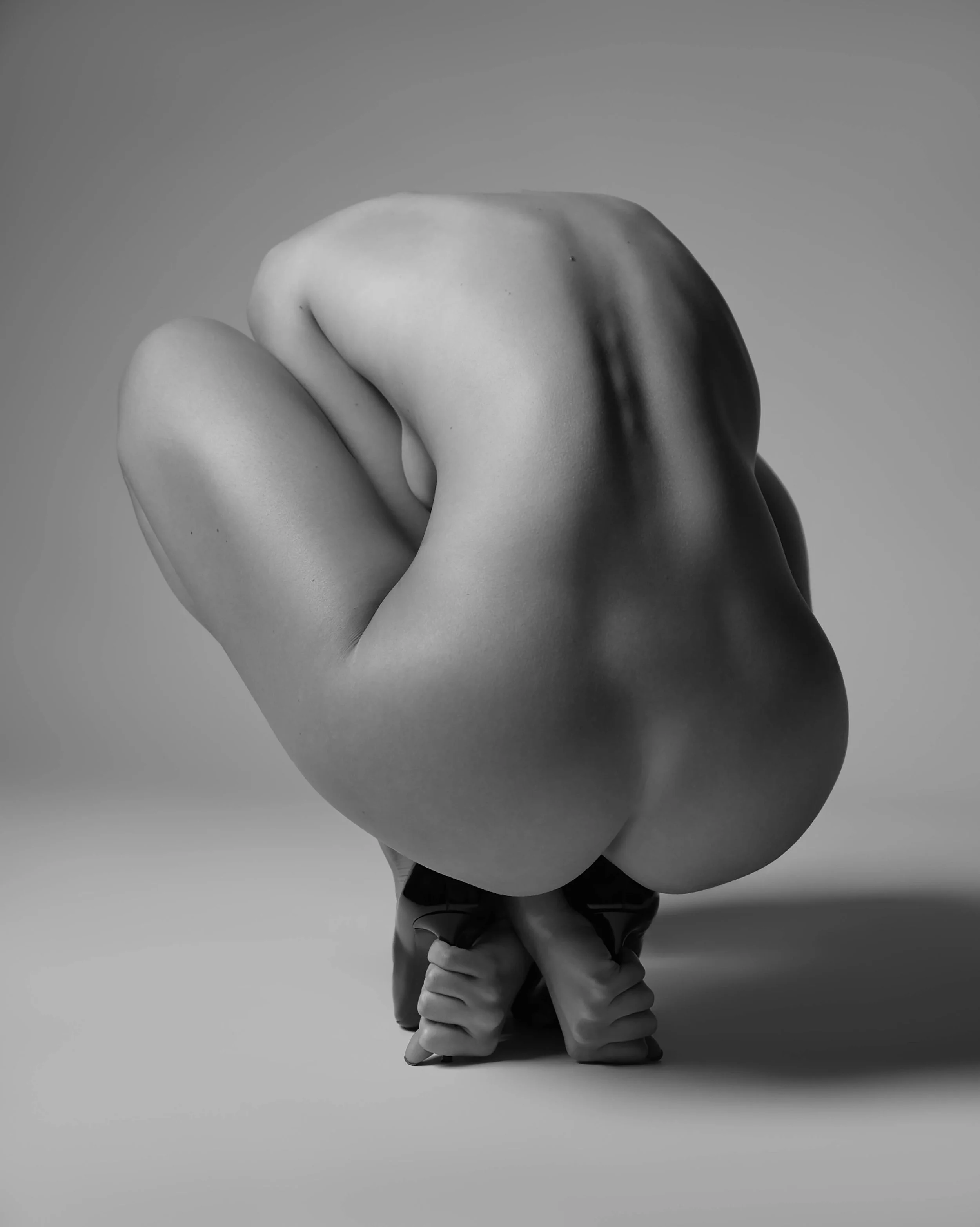 CROUCHED NUDE
