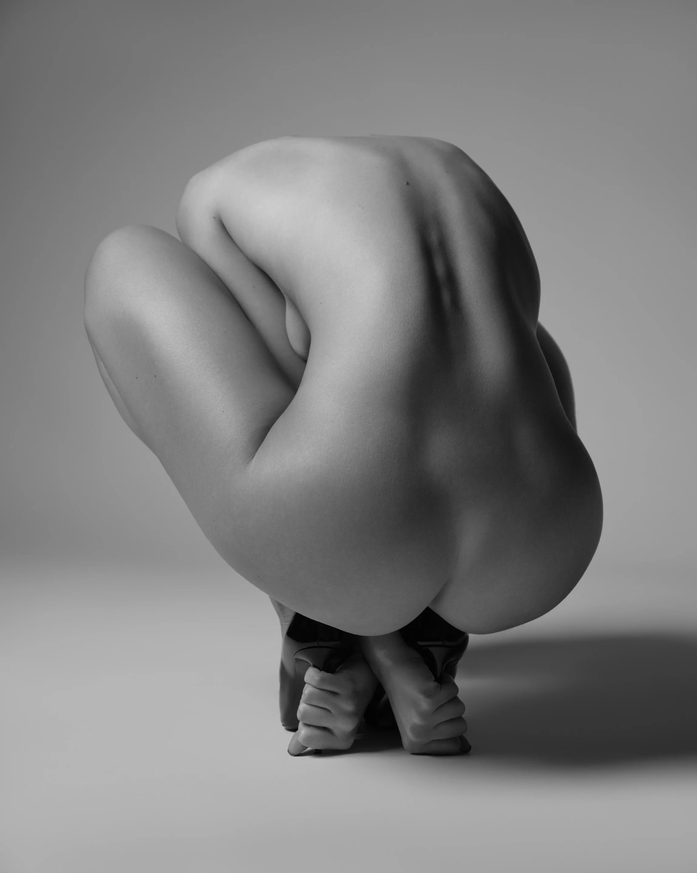 CROUCHED NUDE