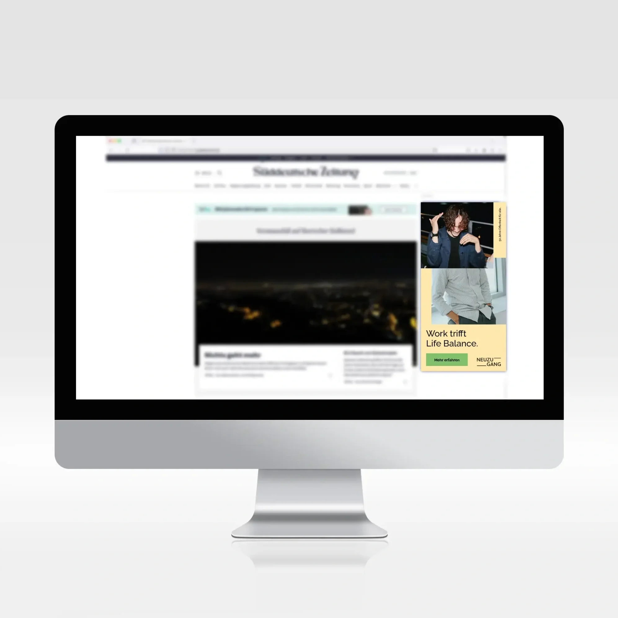 A silver PC screen displaying a website with a clearly outlined advertisement. The advertisement shows a pair of images: at the top, a young man smiling and dancing; at the bottom, the lower torso of a man in a shirt, accompanied by text.