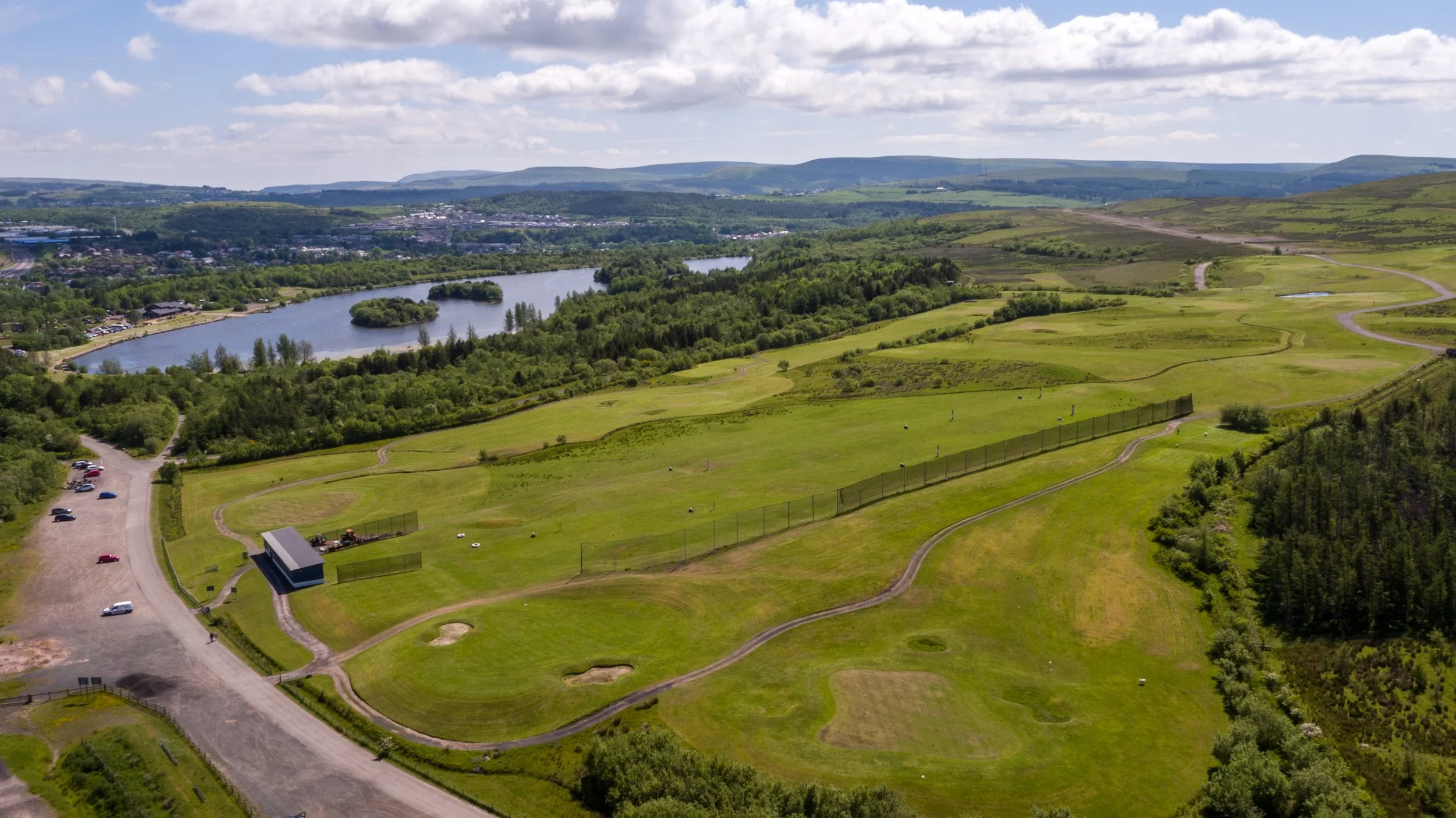 Parc-Bryn-Bach-aerial-view of car park and lake.jpg