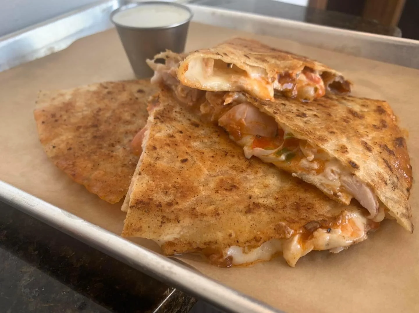 Buffalo Smoked Chicken Quesadilla on special.

Jack cheese, pico, and buttermilk ranch. #buffalochickenquesadilla #kenovasmokehouse #kenovabbq