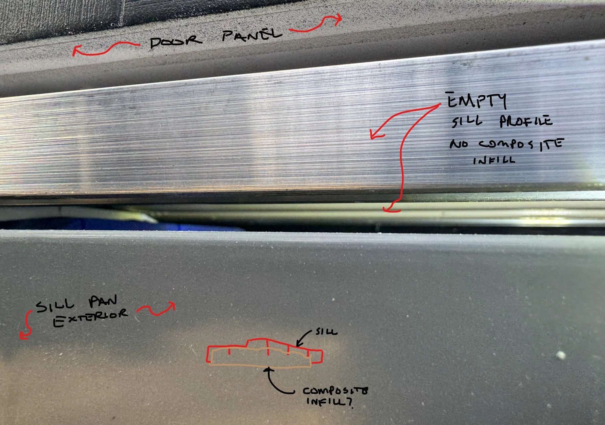 Exterior view looking up at underside of aluminum sill.jpg