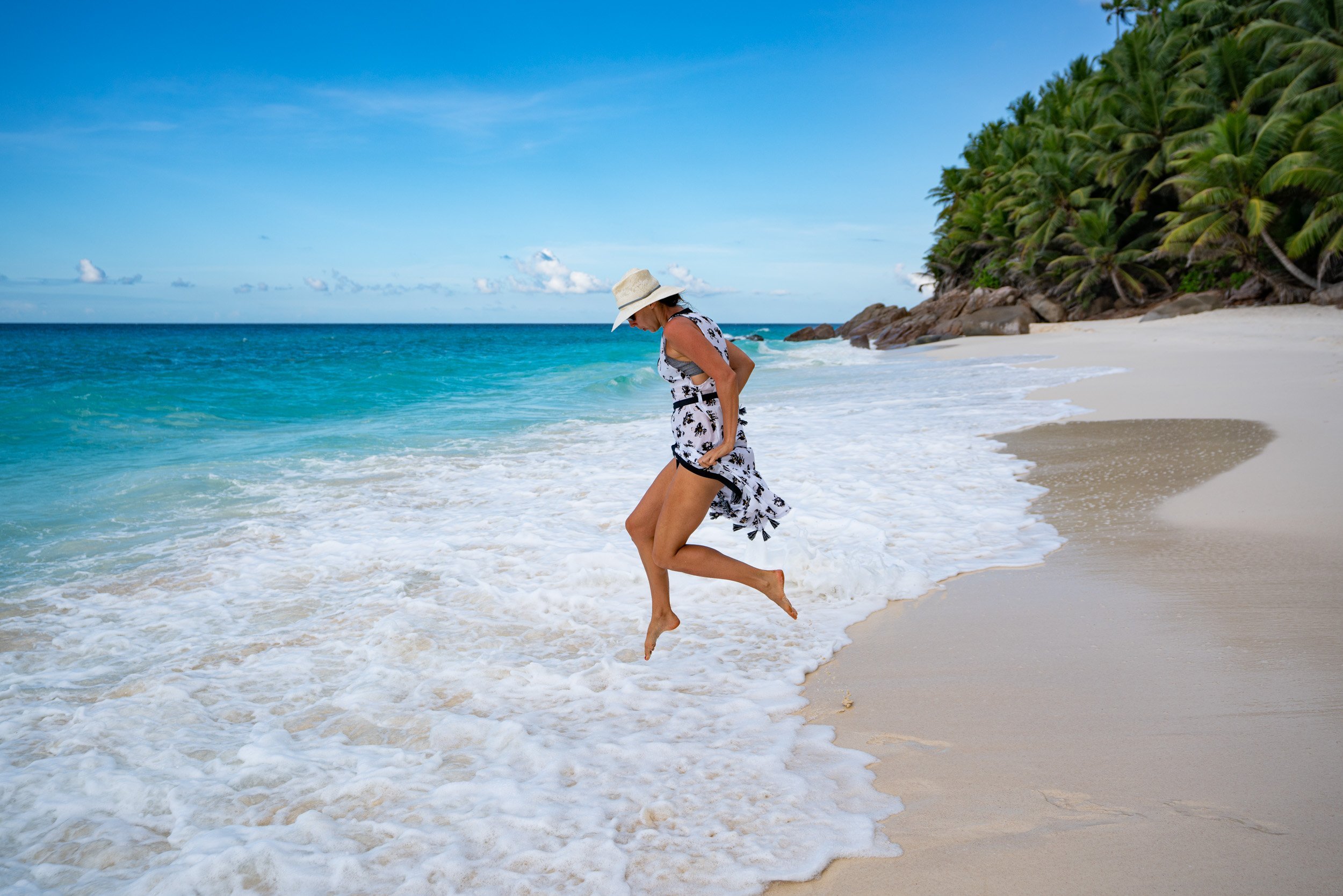 Brooke walking through the surf.jpg
