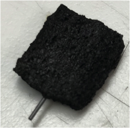 Carbonized (Burned in Absence of Oxygen) Bread with Graphite lead for Power Source Connection
