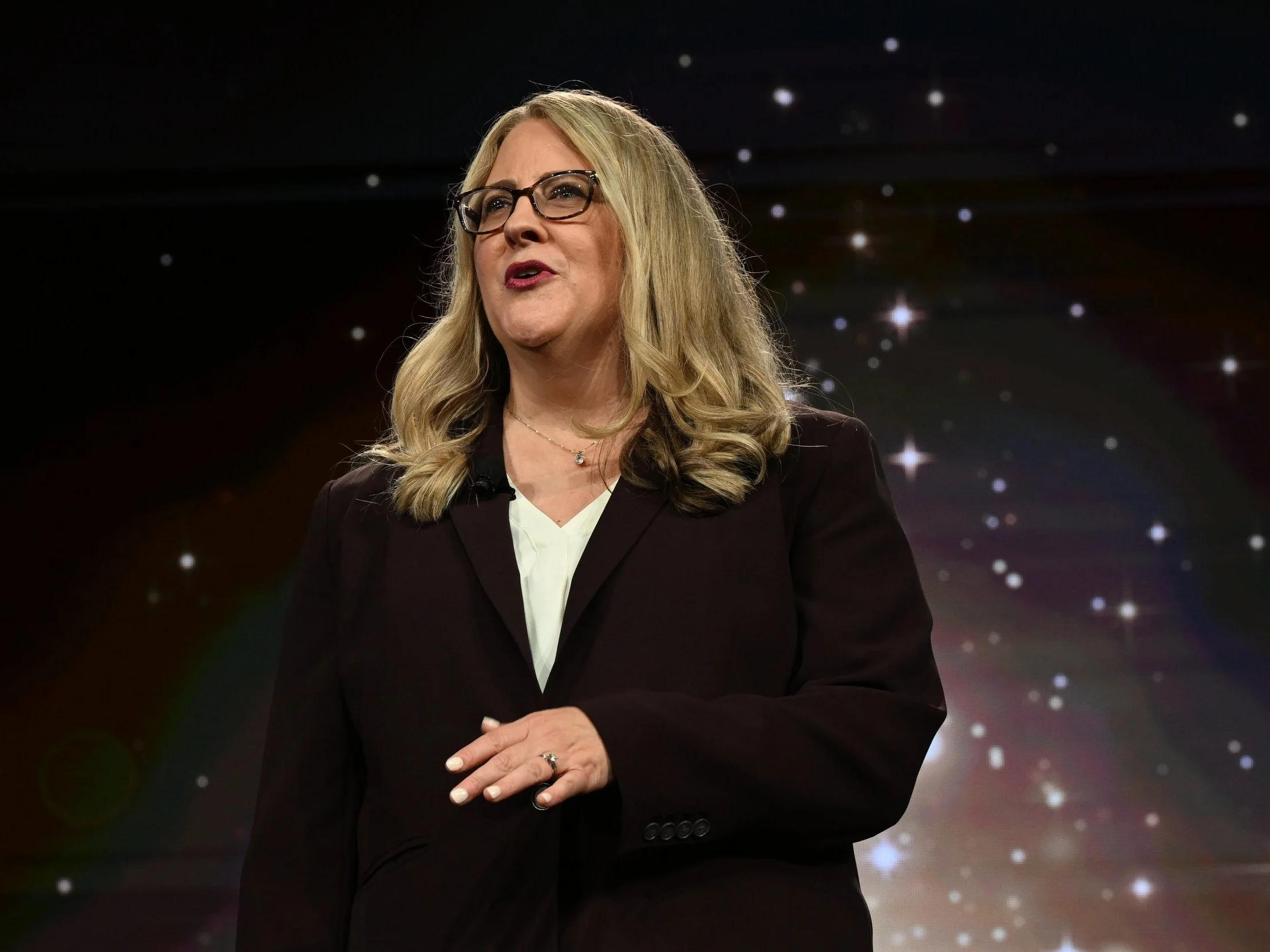 Karen Eber giving a keynote onstage
