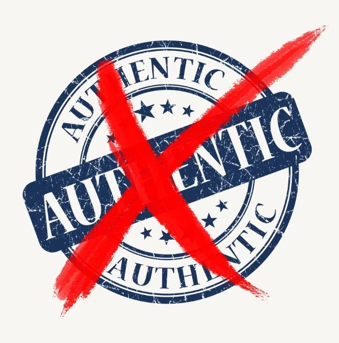 A stamp with the word authentic and five stars crossed out by a big red x