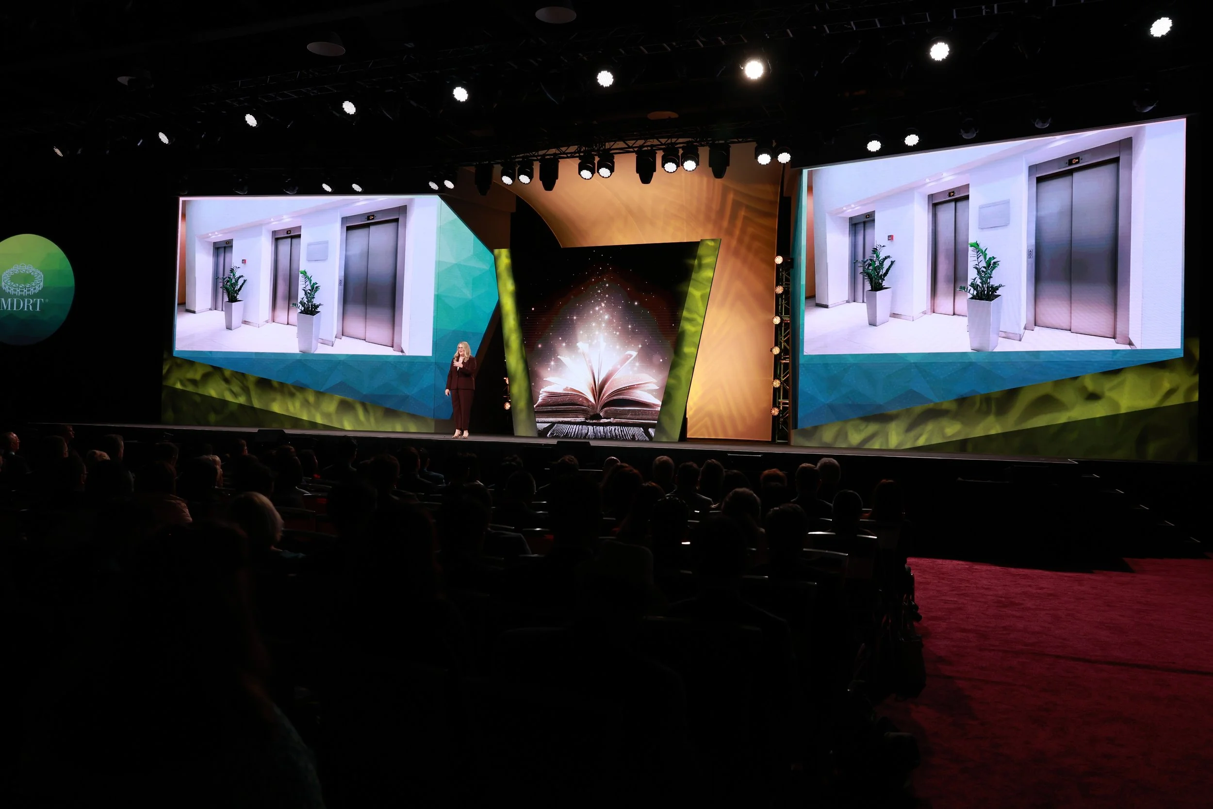 Karen Eber giving a storytelling with data keynote at a large conference