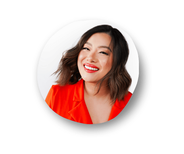 Close-up headshot of Ellen Yin, Founder and podcast host of Cubicle to CEO, smiling and looking confident.