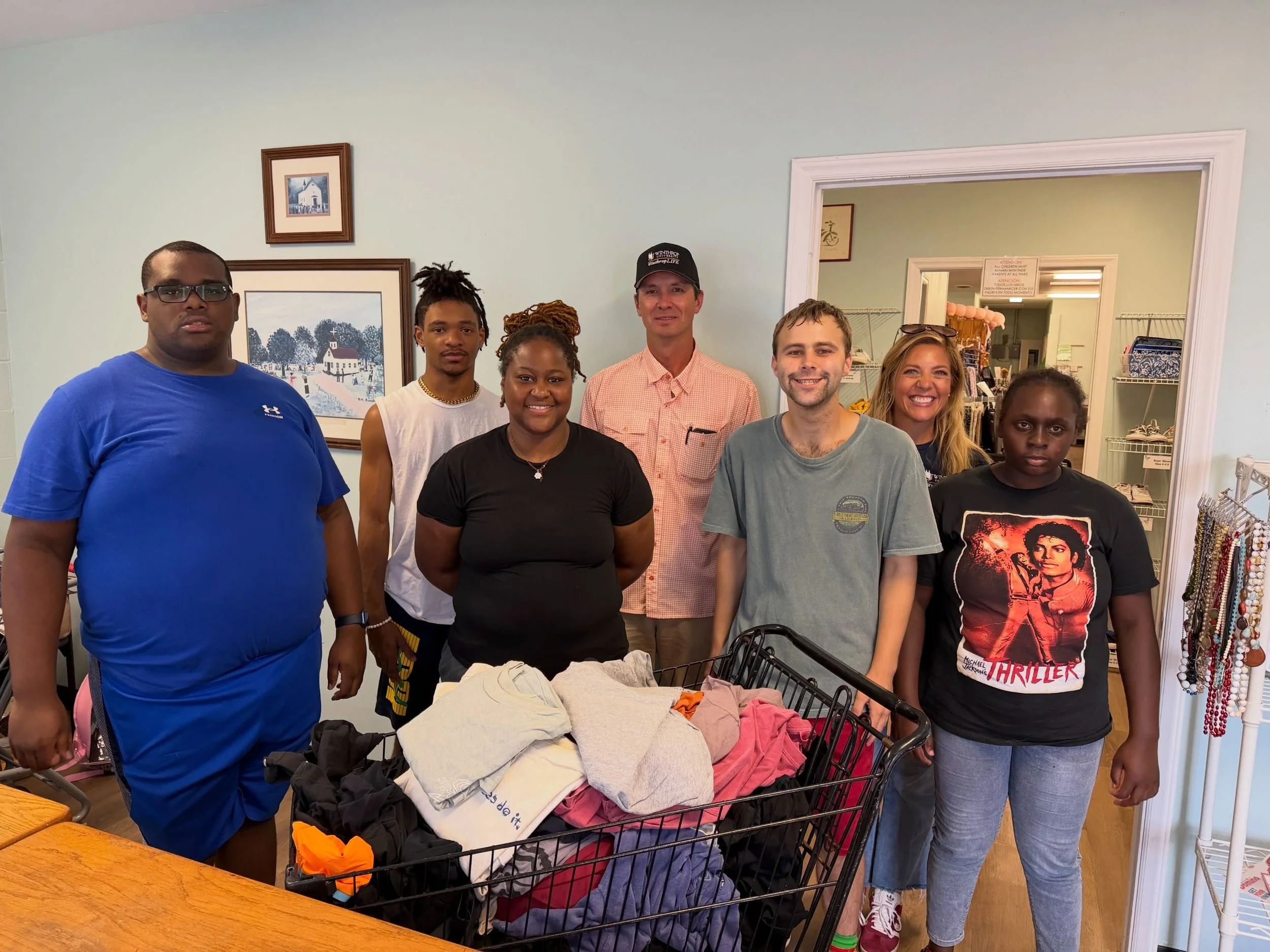 What a joy it was to welcome students from the WinthropLIFE program to our Ministry Center today! After a tour of the building, they rolled up their sleeves and got to work, inspecting over 300 t-shirts to decide which ones we&rsquo;d keep, and which
