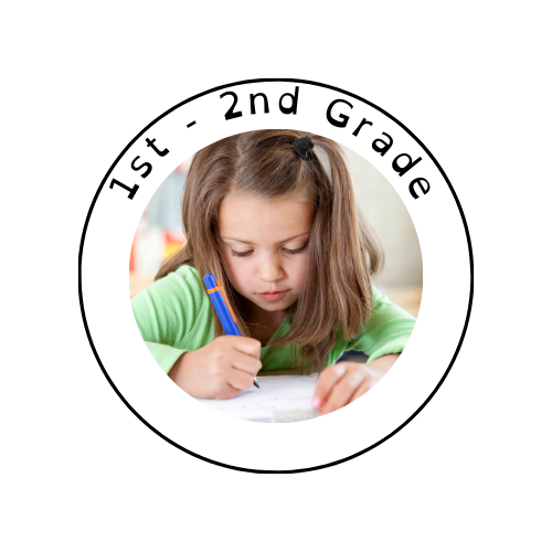 Young girl writing with a blue pen on paper, wearing a green top, focused on her work.