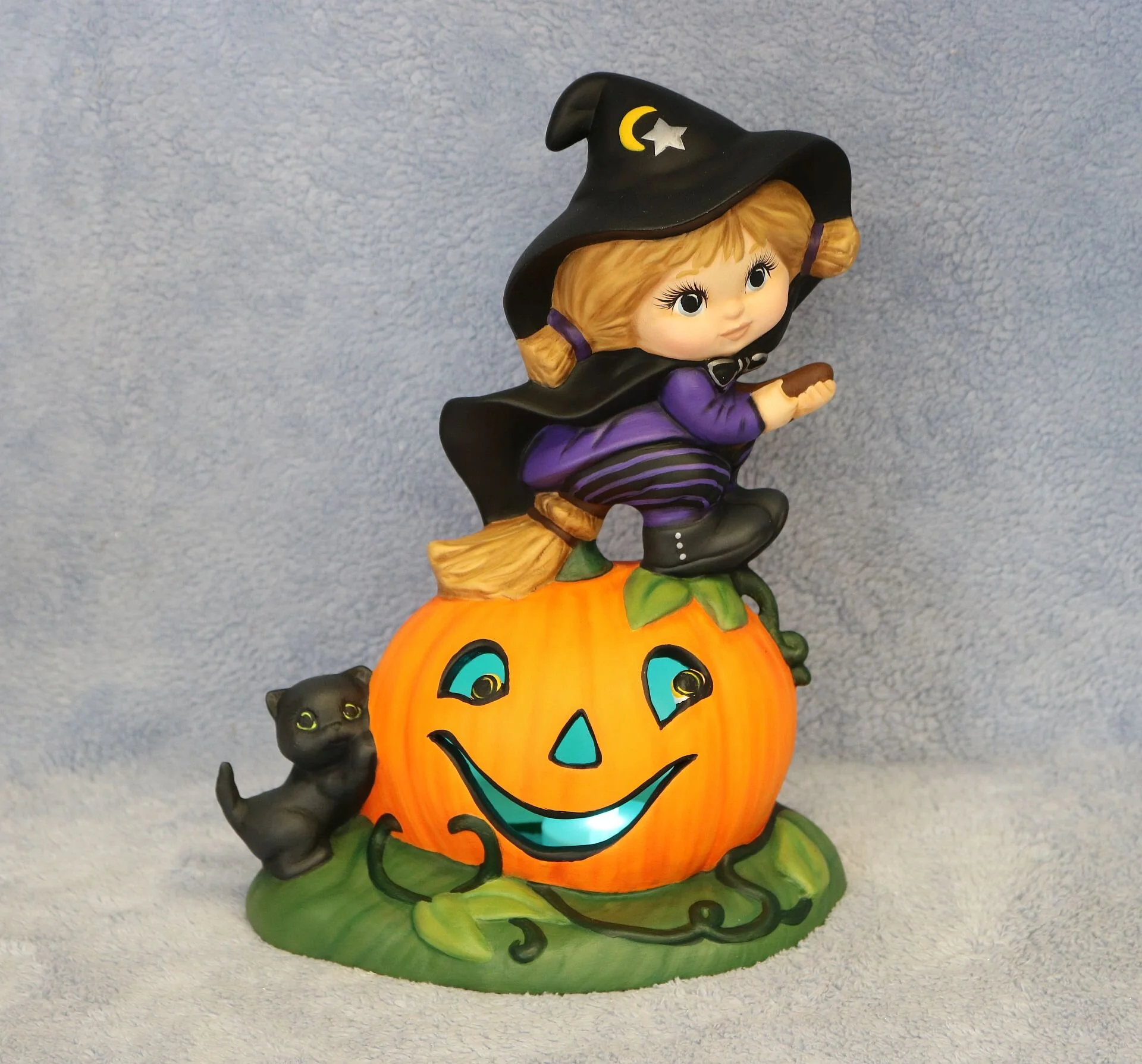 Witch Riding Pumpkin Ceramic