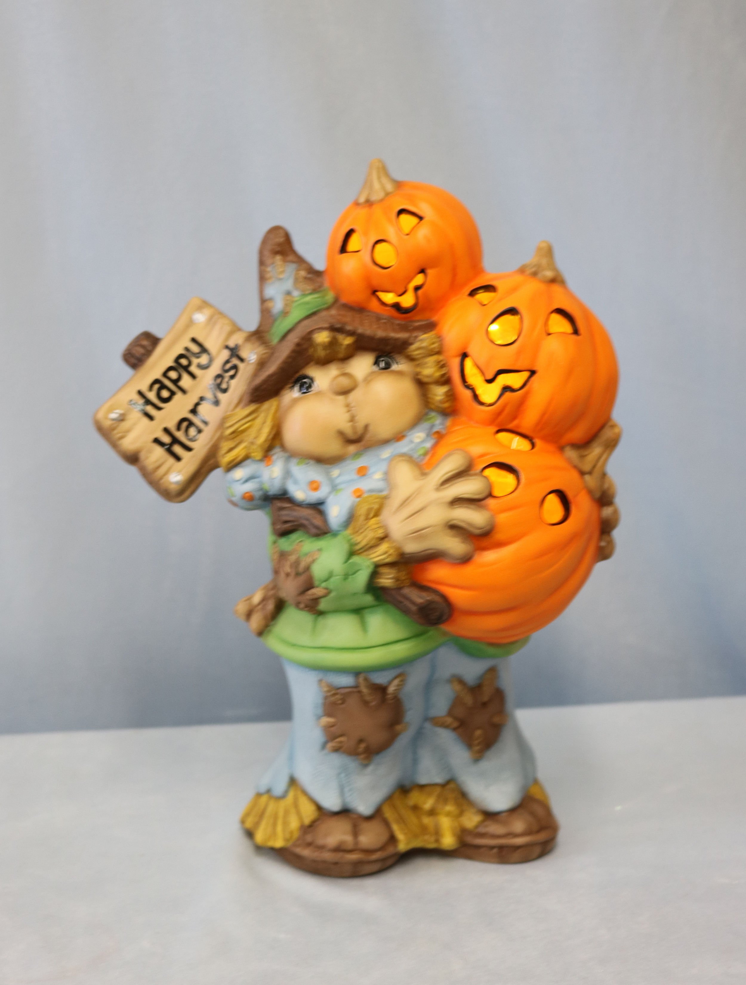 Scarecrow holding Pumpkins 2.jpg