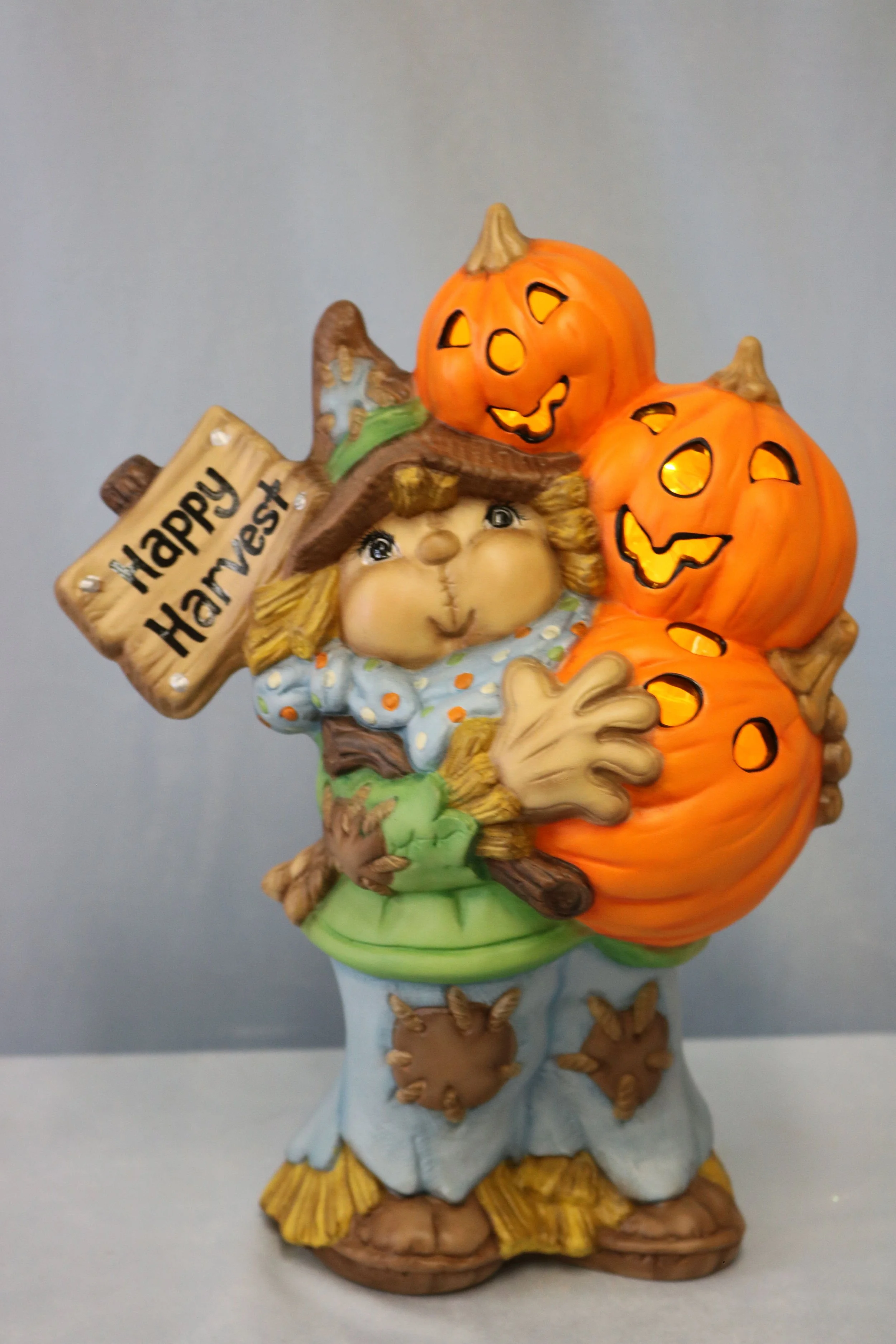 Scarecrow holding Pumpkins 3.jpg