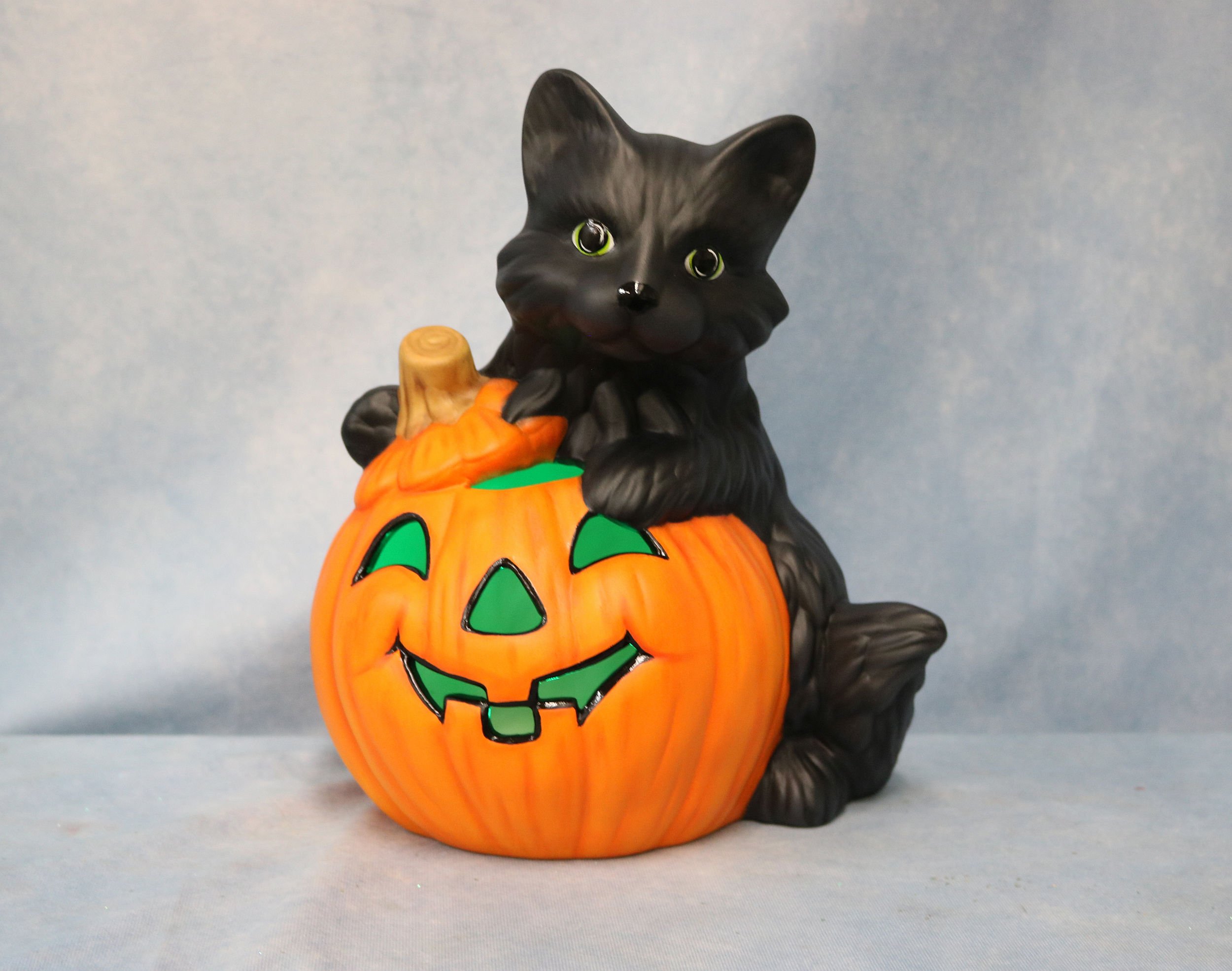 Ceramic Black Cat holding a Jack O' Lantern