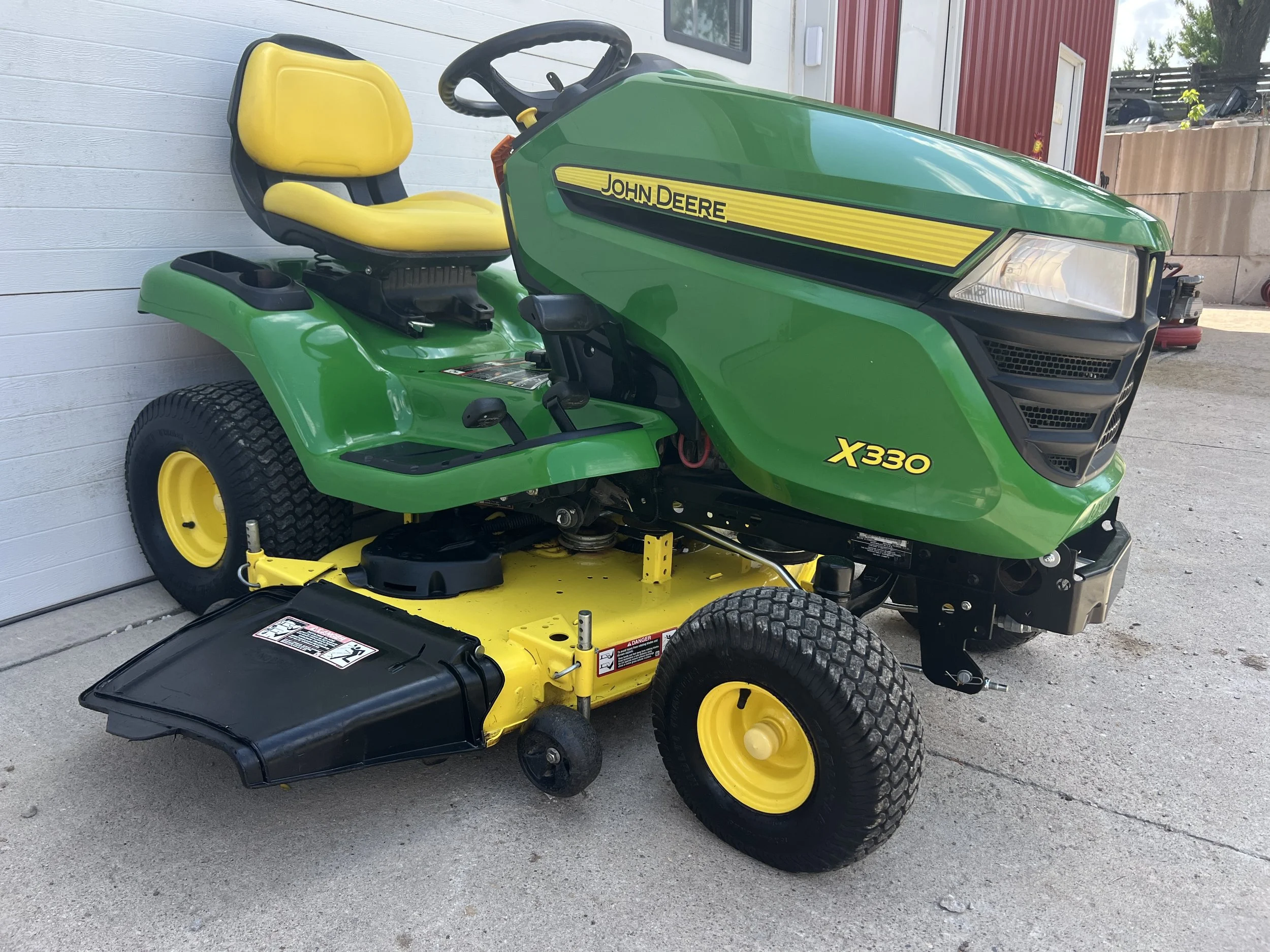 2019 John Deere X330 tractor 48" deck 67 hours. Like new tractor. 20 horse engine. $3299