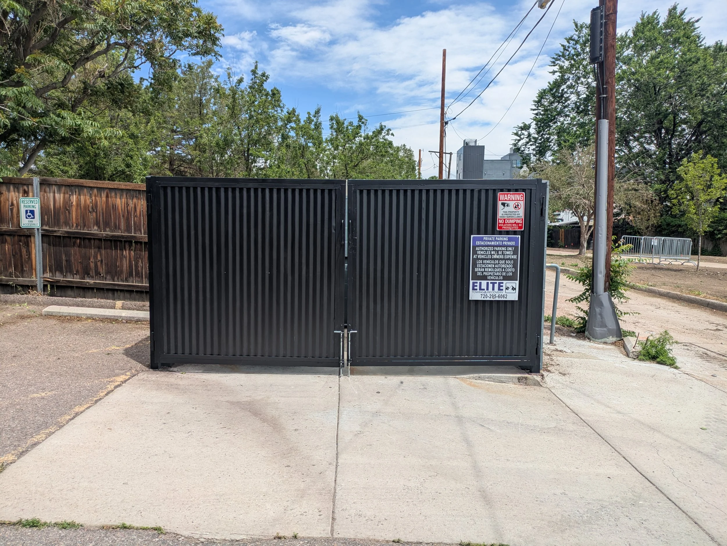  "after" photo of some dumpster enclosure doors. They were heavily damaged and needed new hinges, latches, panels, and handles.