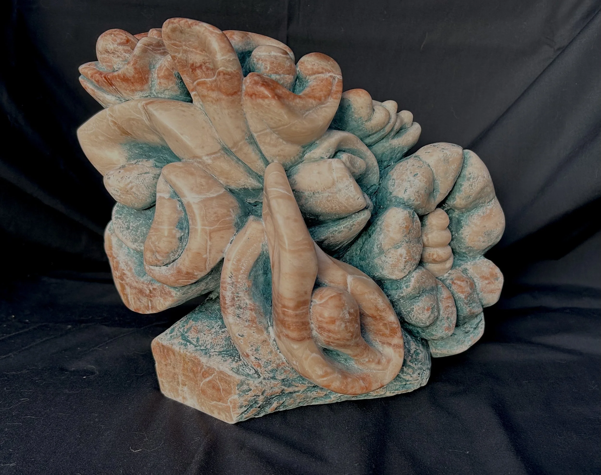 Gary Colson, Blooming, Alabaster, 14x14x7 in. $2,000