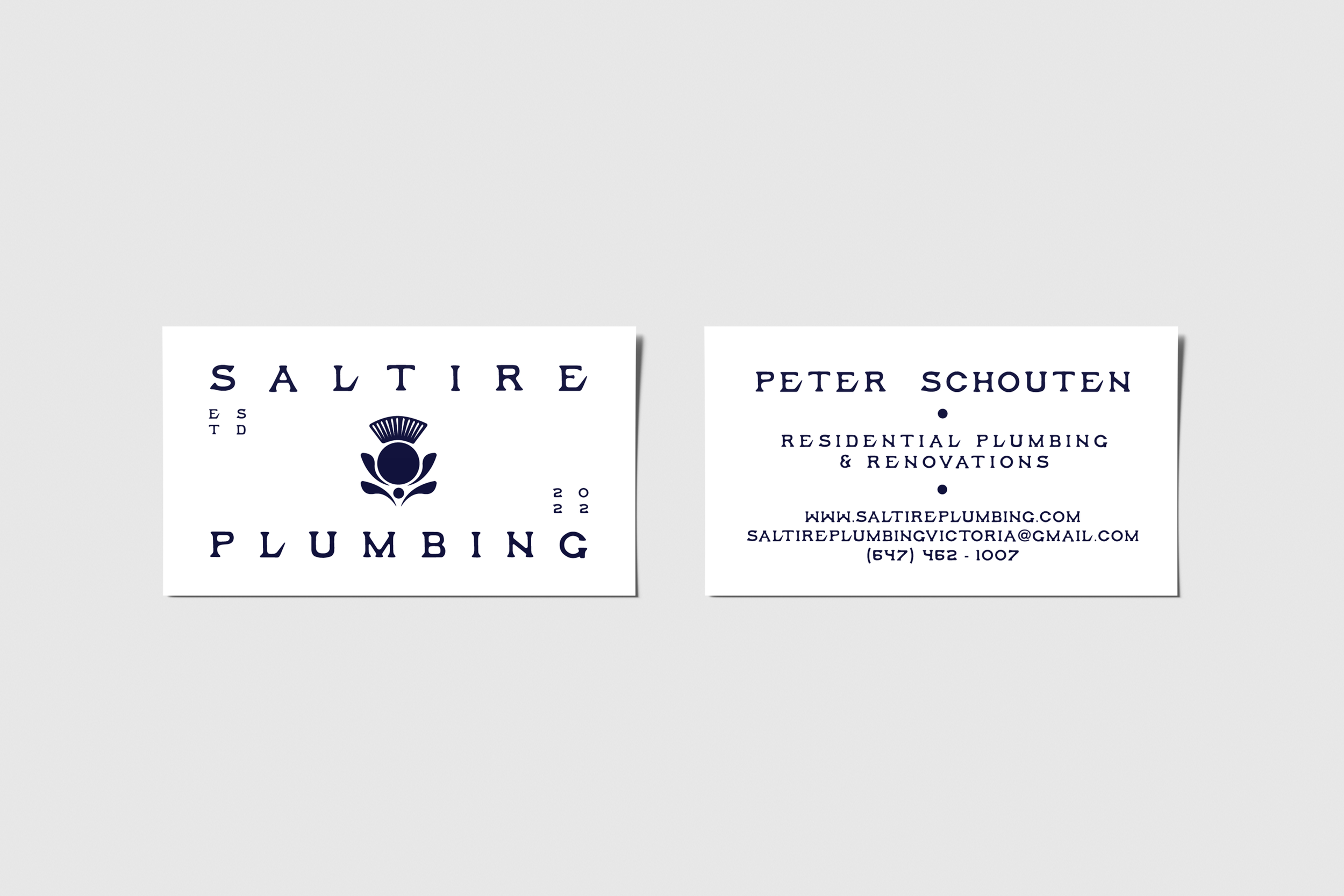 Business card for Saltire Plumbing with logo and contact information.
