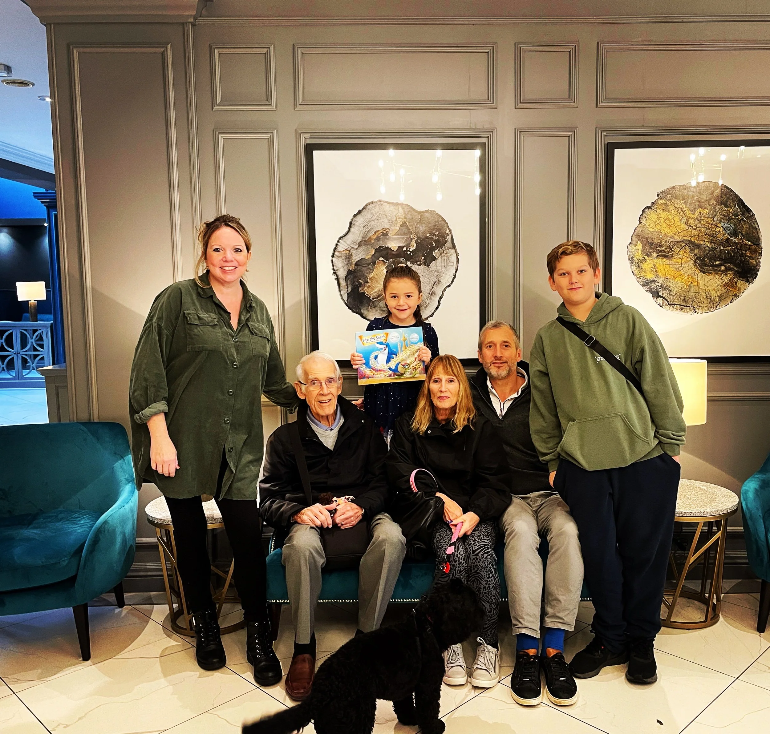 No family portrait would be complete without @bitethesharkbook, the newest member of our family!! 🙌🙏🦈💙💜