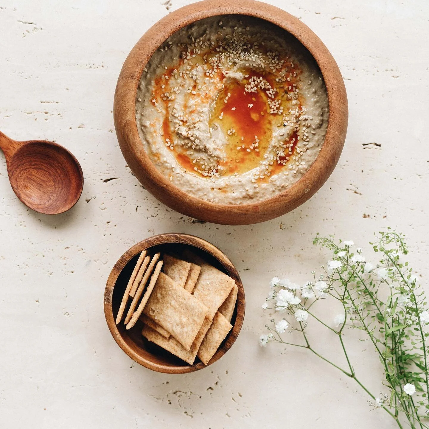 For all the late planners and fancy dip lovers, this one&rsquo;s for you. An easy hummus uplifted by the addition of black garlic. It ads a rich and sweet umami layer to this humble dip and I&rsquo;m digging it.

Take this
- 1 can chickpeas, drained 