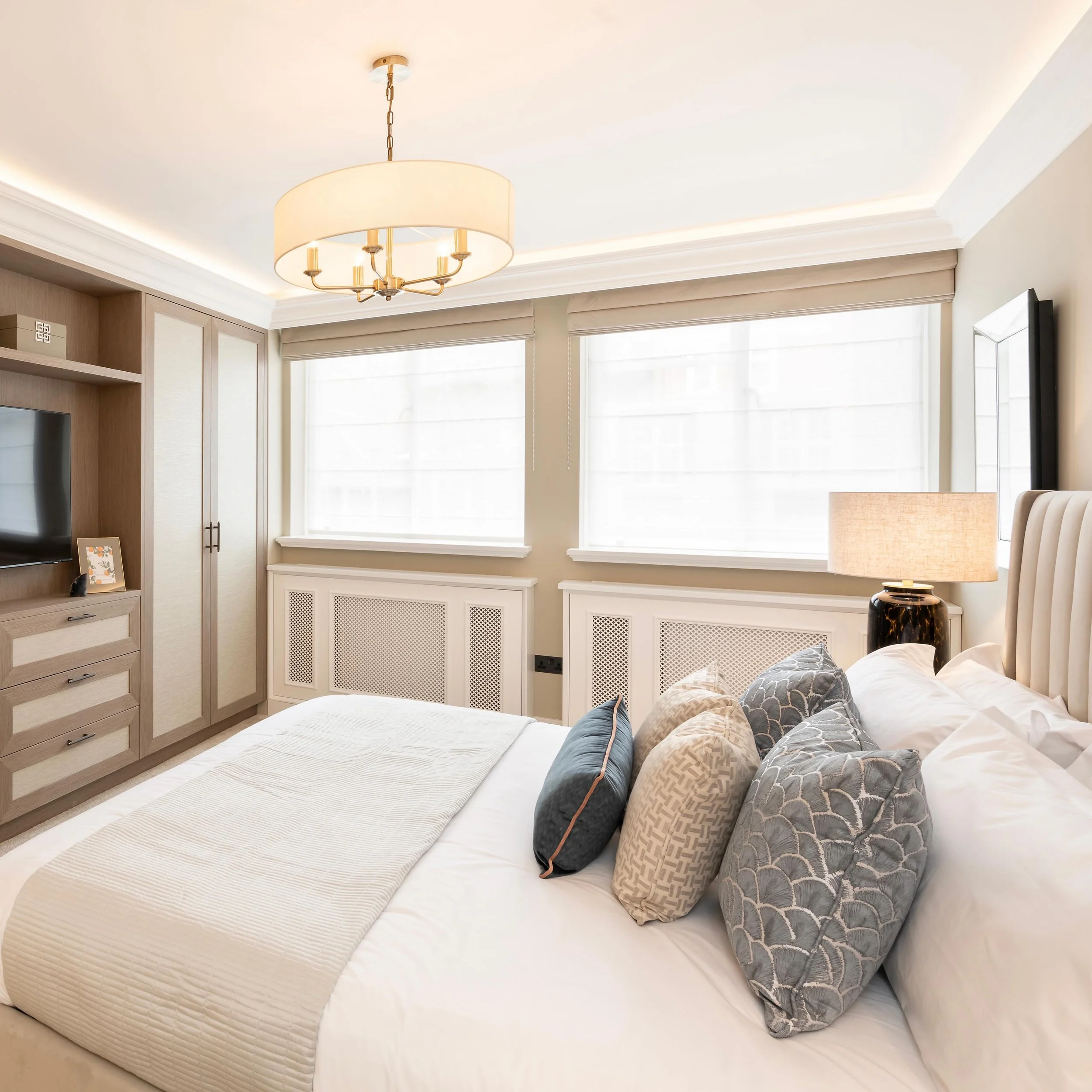 Sharing a few images from a project we completed in Grosvenor Square. Hiding the AC unit behind the tv, with the air slot in the coffered ceiling was definitely a good idea!! 

🛋️ @enelproperties 
📷 @penguinseggstudio