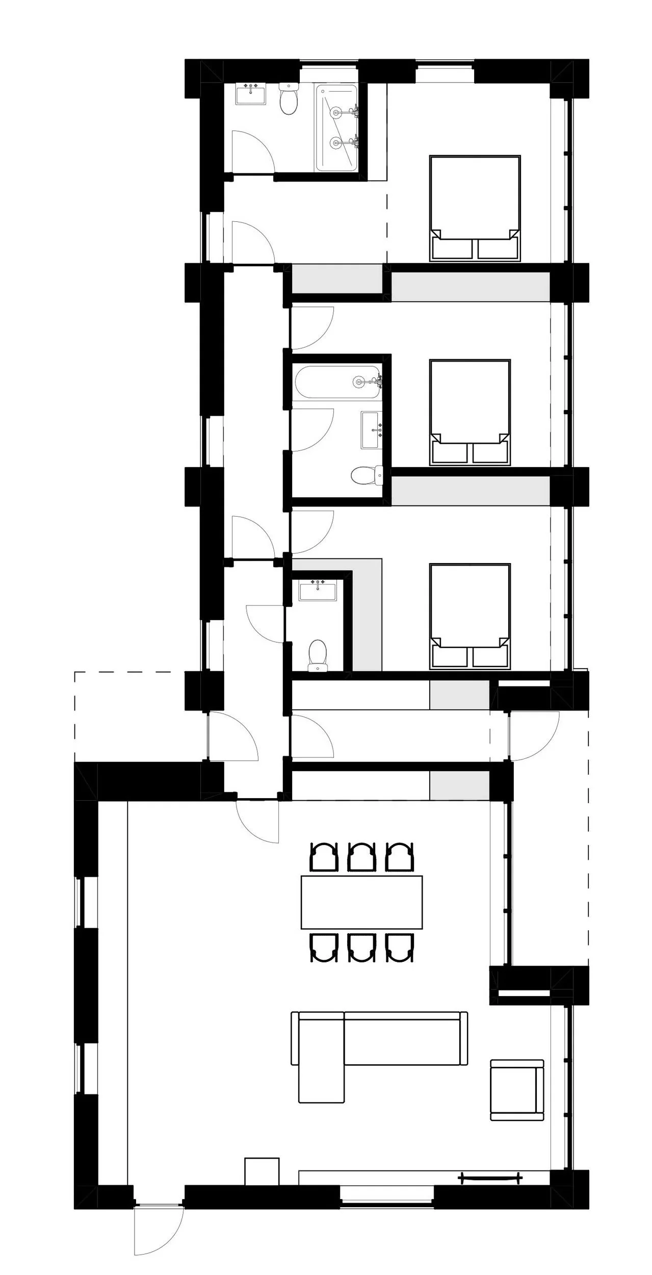 Floor plan of a duplex house with two bedrooms, two bathrooms, a living room, a dining area, and a kitchen.