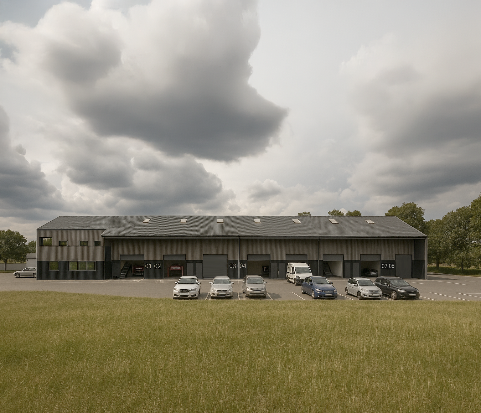 Industrial warehouse building with cars parked in front, labeled units, under a cloudy sky