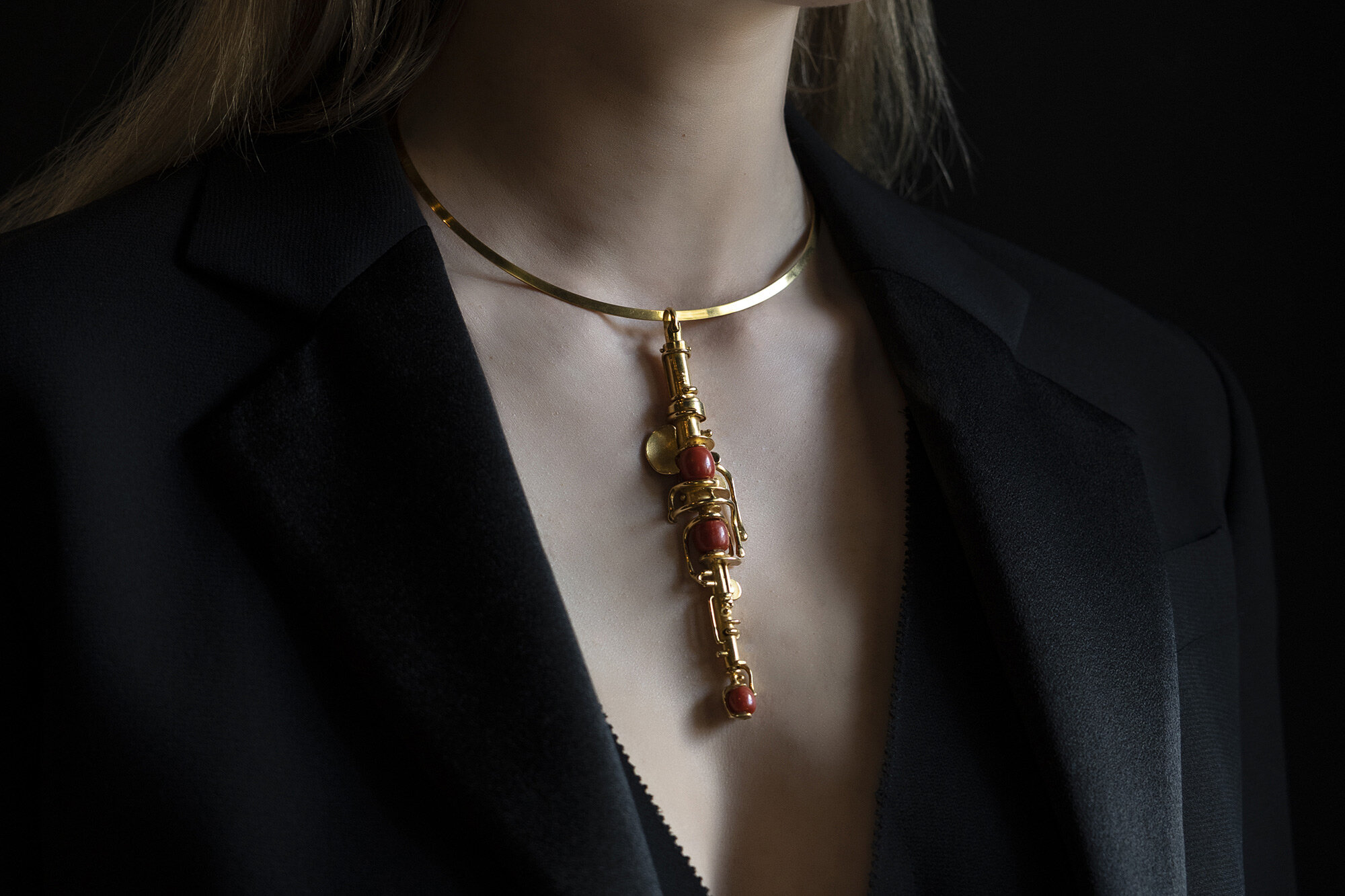 Fernand Demaret an abstract gold and coral pendant