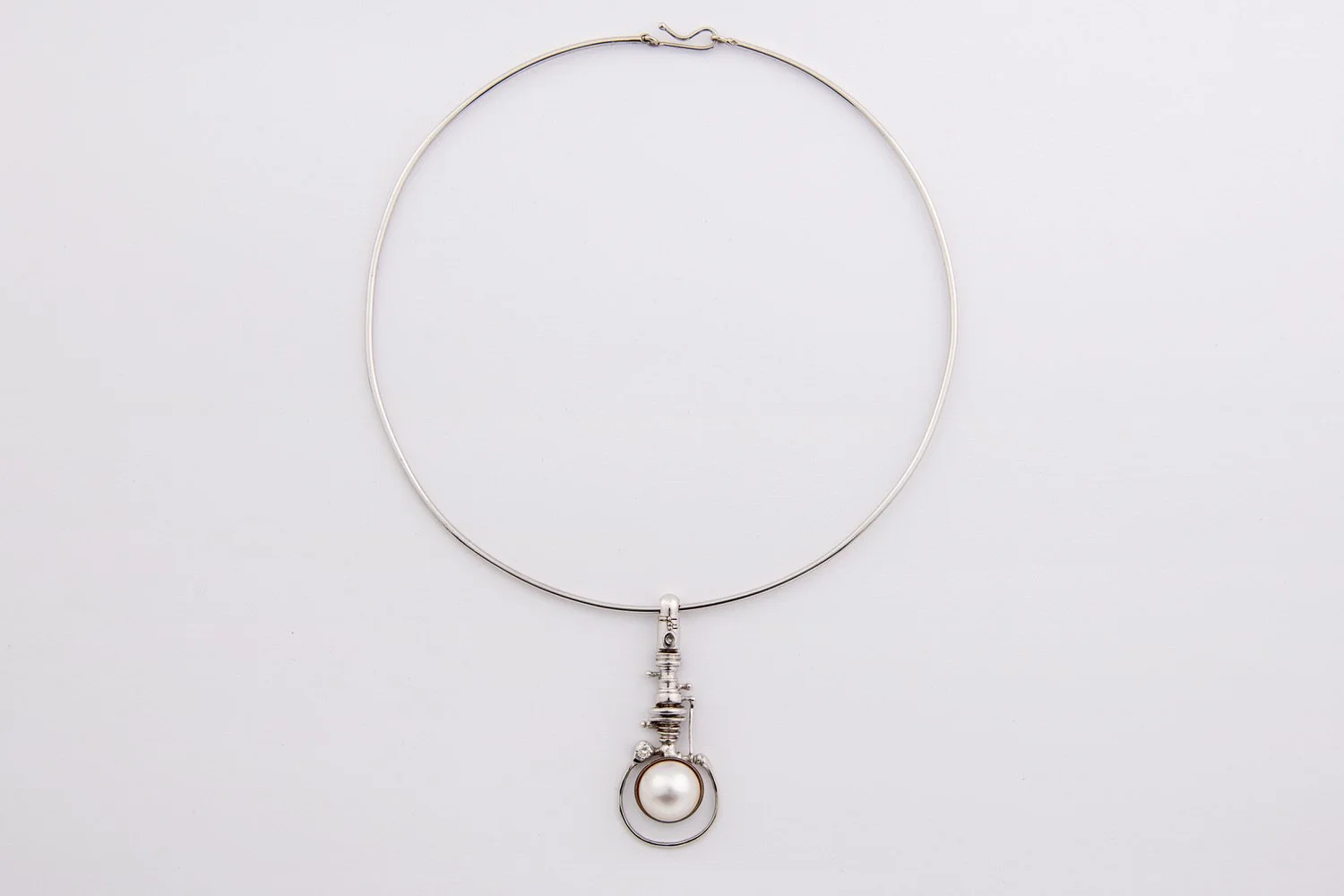 Fernand Demaret  : A white Gold and pearls pendant