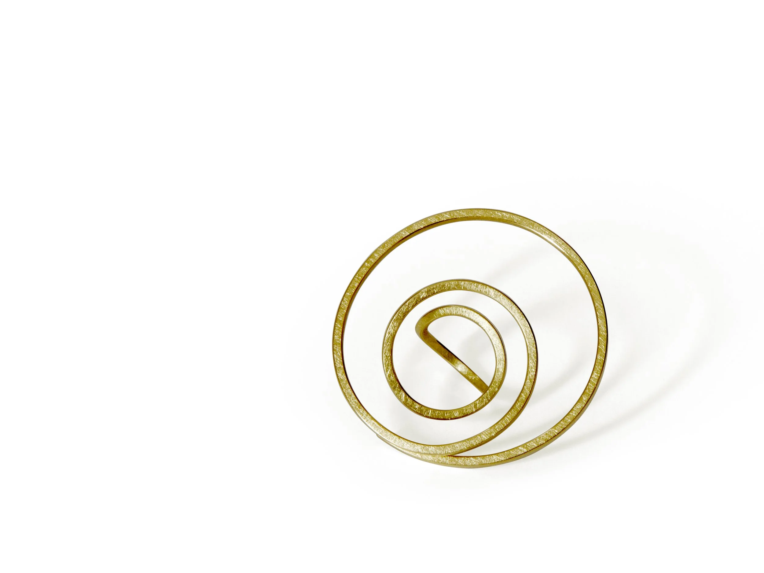 ute-decker-Infinity- Spiral-large-sculptural gold-ring.jpg