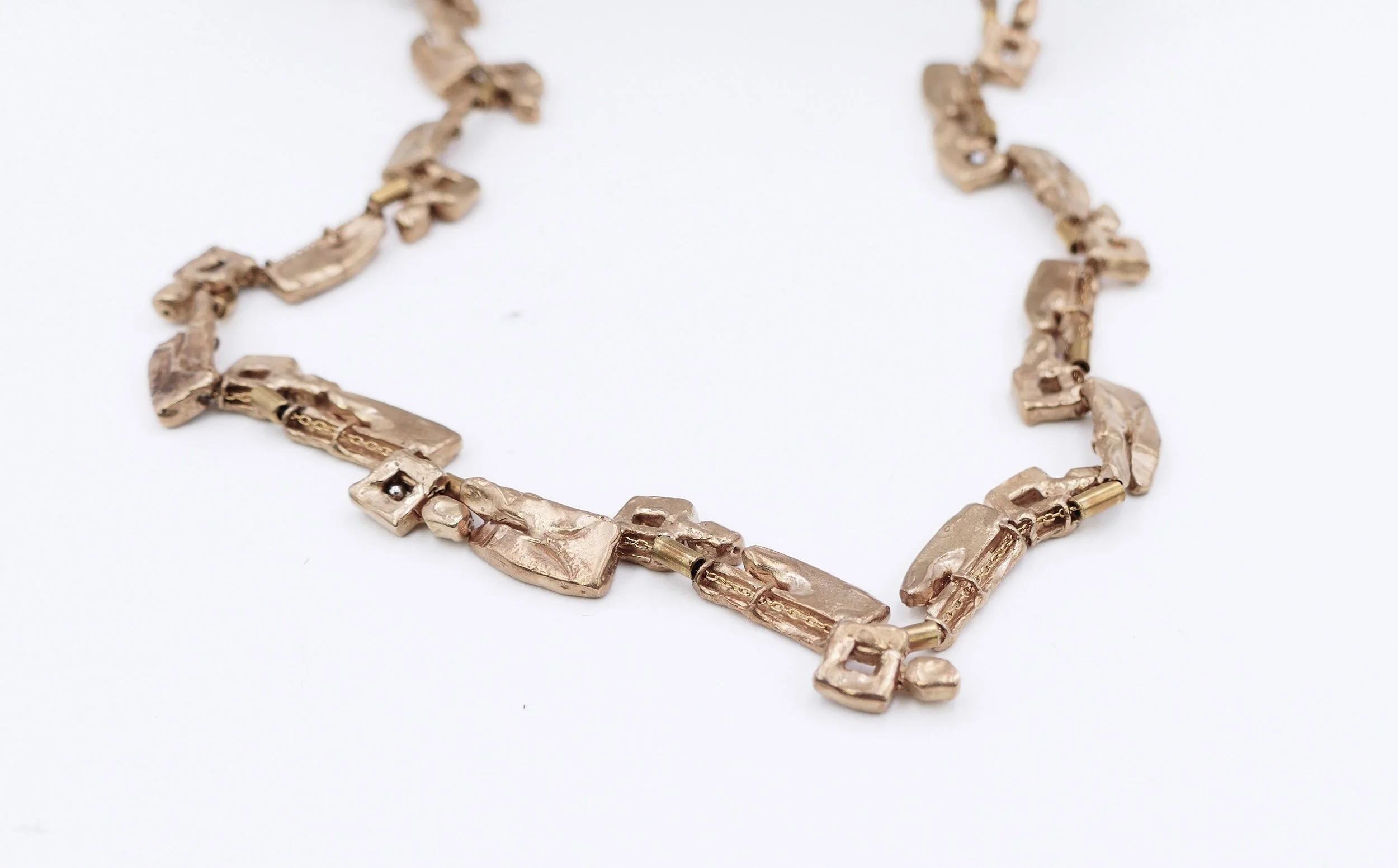 nisa chevenement Hieroglyphs brass necklace 2.jpg