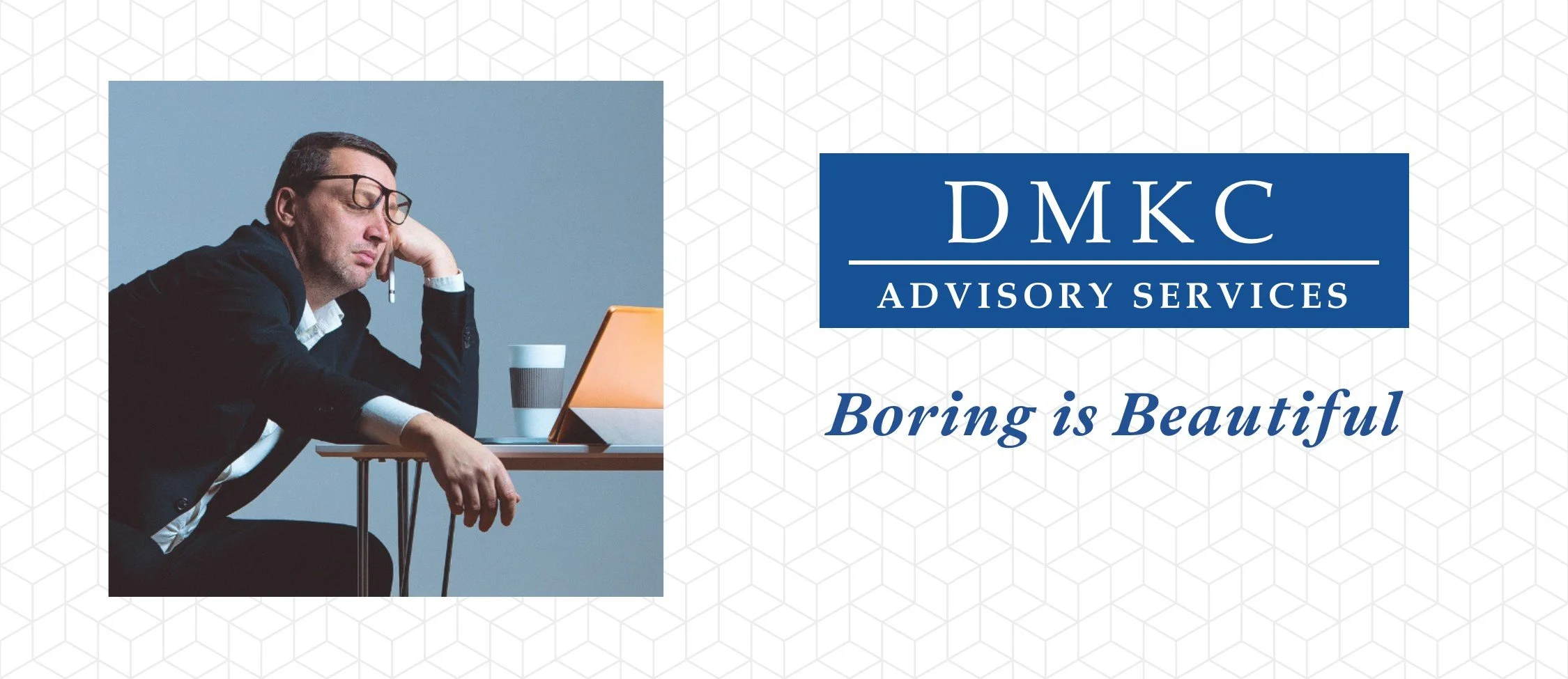 DMKC Advisory Services: Boring is Beautiful. A man in a suit dozes at his desk beside a laptop and a coffee cup.
