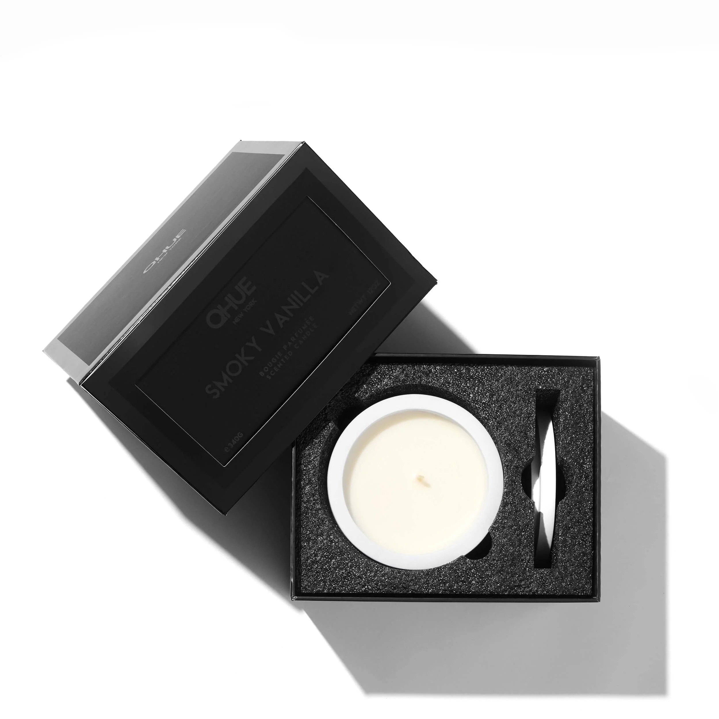 smokyvanilla  candle packaging, a sleek black gift box by Qhue New York