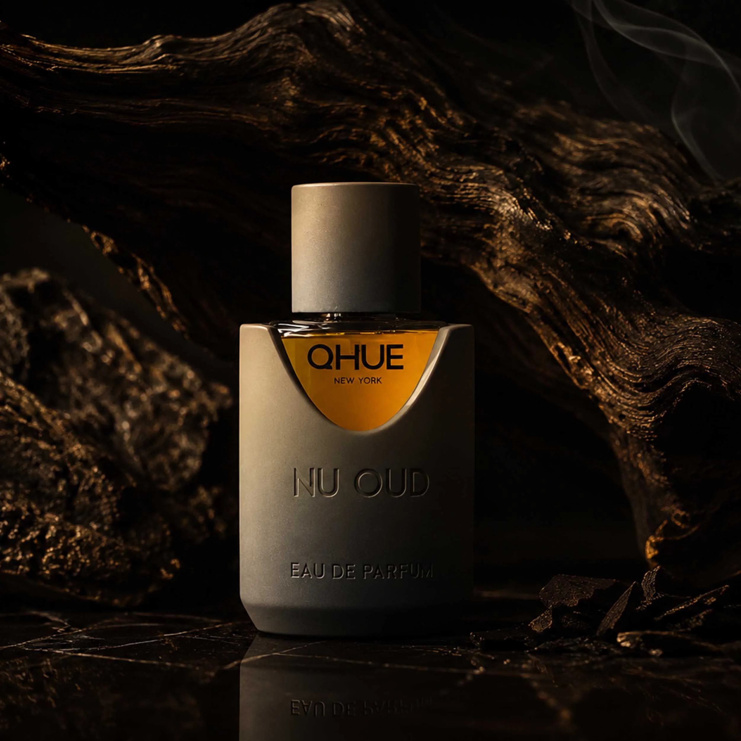 Qhue New York Nu Oud Eau de Parfum luxury fragrance featuring grapefruit, oud, incense, jasmine, and musk.