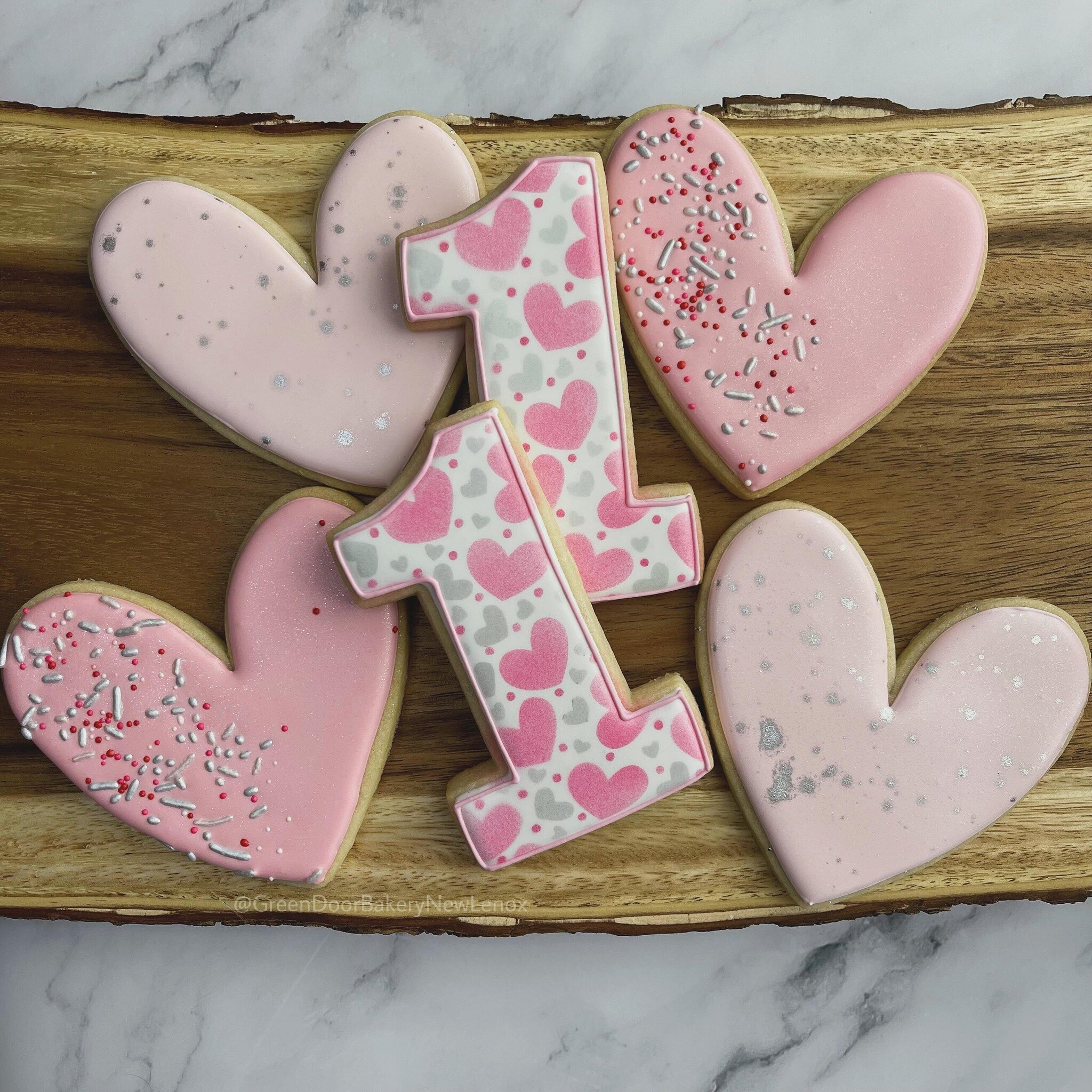 Happy First Birthday!  What a sweet way to celebrate with a heart theme 😍 ❤️ 

#Greendoorbakerynewlenox #newlenox #newlenoxil #newlenoxillinois #illinois #instacookies #customcookies #sugarcookies #homebaker #cookies #yum #edibleart #heartcookies #h