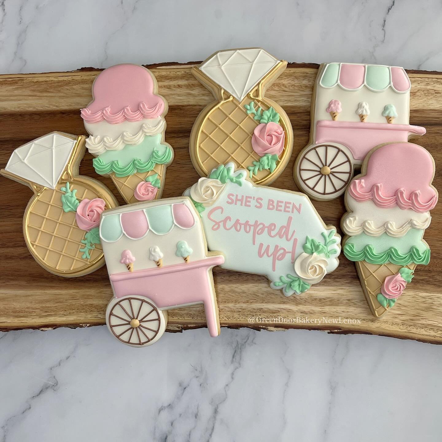 What a cute shower theme! She&rsquo;s been scooped up 😍 Congratulations to the beide and groom! 🎉 🥂 

#Greendoorbakerynewlenox #newlenox #newlenoxil #newlenoxillinois #illinois #instacookies #customcookies #sugarcookies #homebaker #cookies #yum #e