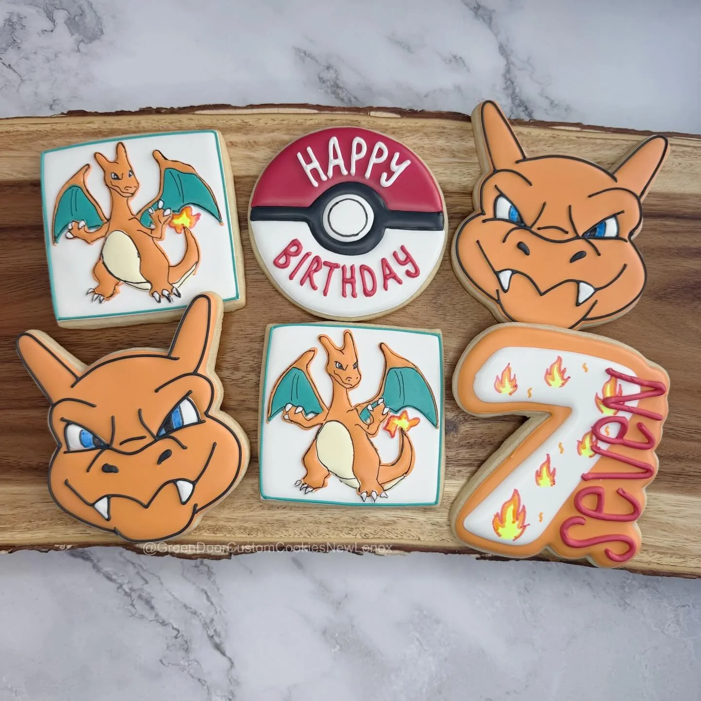 Happy 7th birthday! 🔥 🎉 

#greendoorcustomcookiesnewlenox #newlenox #newlenoxil #charizardcookies #pokemoncookies
