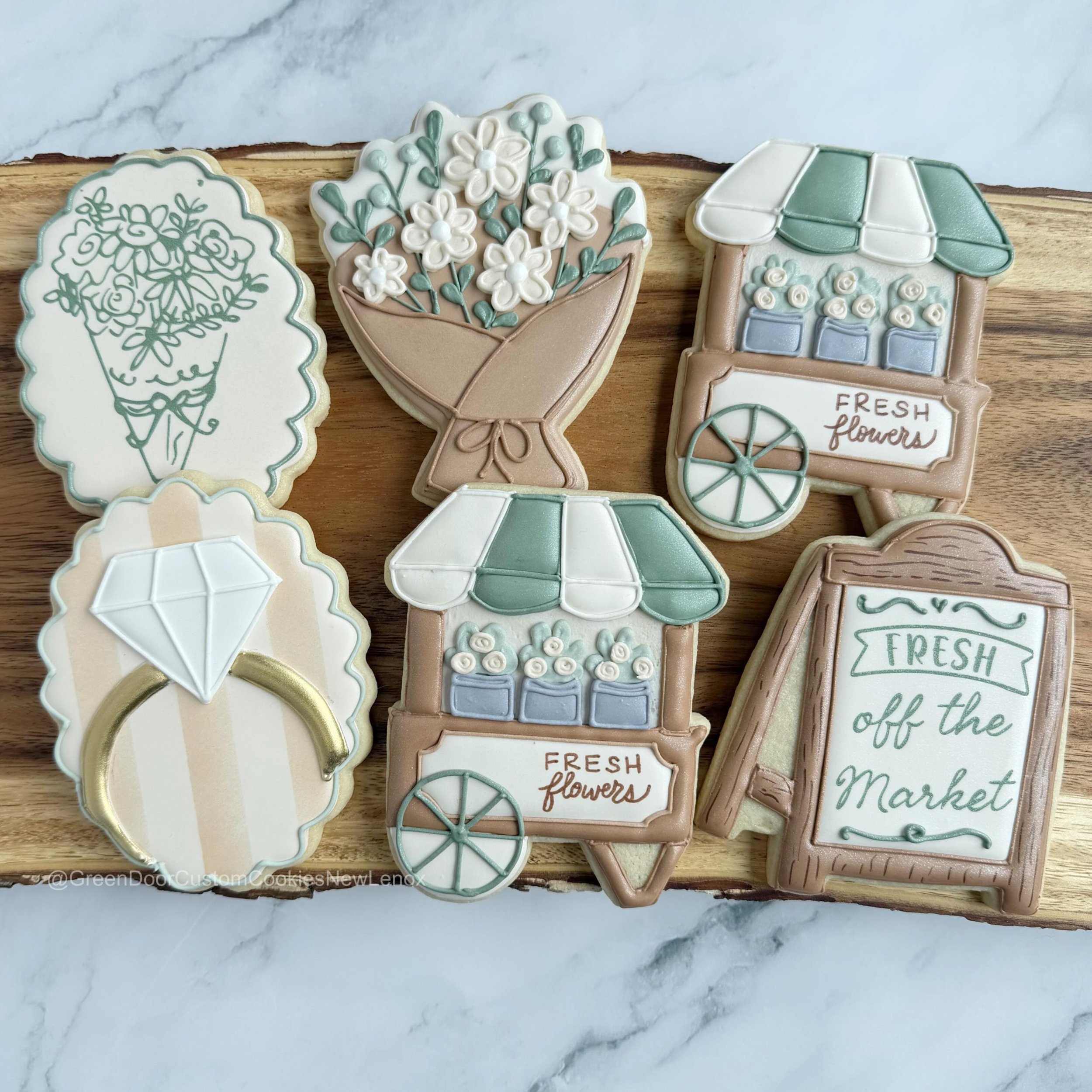 Congratulations! 🎉 💍 What a fun bridal shower theme! 

#newlenoxil #newlenoxillinois #shesfreshoffthemarketcookies #shesfreshoffthemarket #floralbridalshowercookies