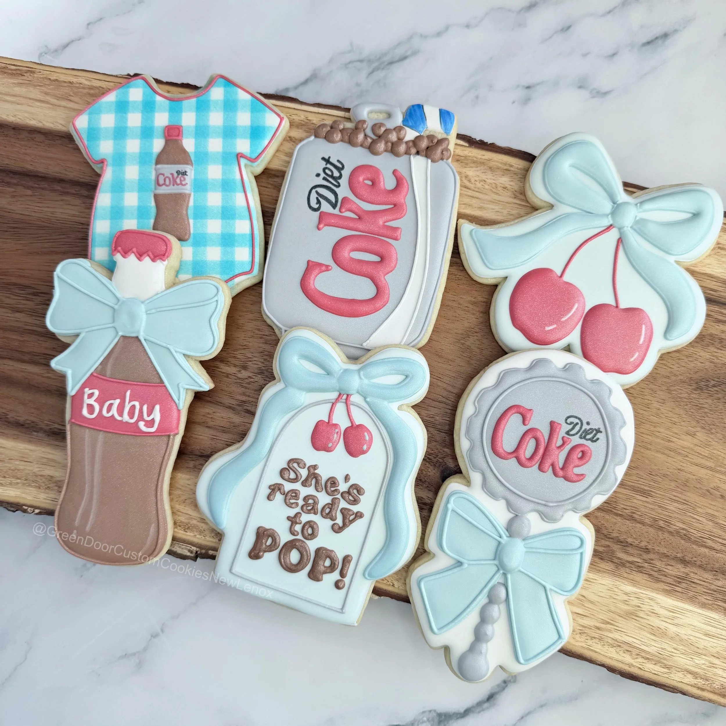 Congratulations!! 🩵 🍒 🎉

What a fun and playful shower theme!! 

#Newlenoxil #newlenoxillinois #shesreadytopopcookies #dietcokecookies #babyshowercookies