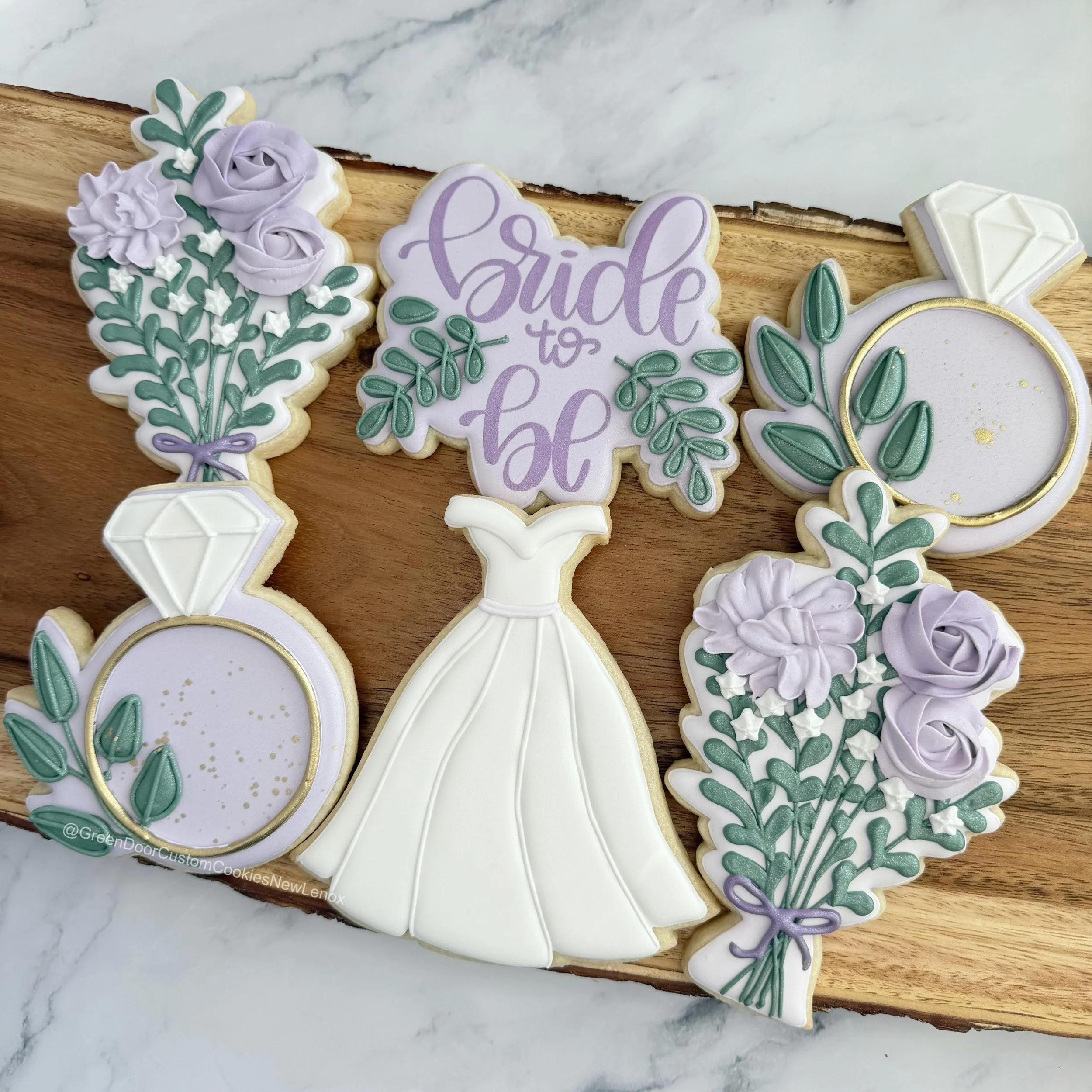 Lovely lavender bridal shower cookies. Congratulations! 🎉 💜 

Shoutout to my beautiful lavender plant growing on my front porch for helping me color match the icing. 🙌🏻 

#Newlenoxil #newlenoxillinois #bridalshowercookies #weddingshowercookies #l