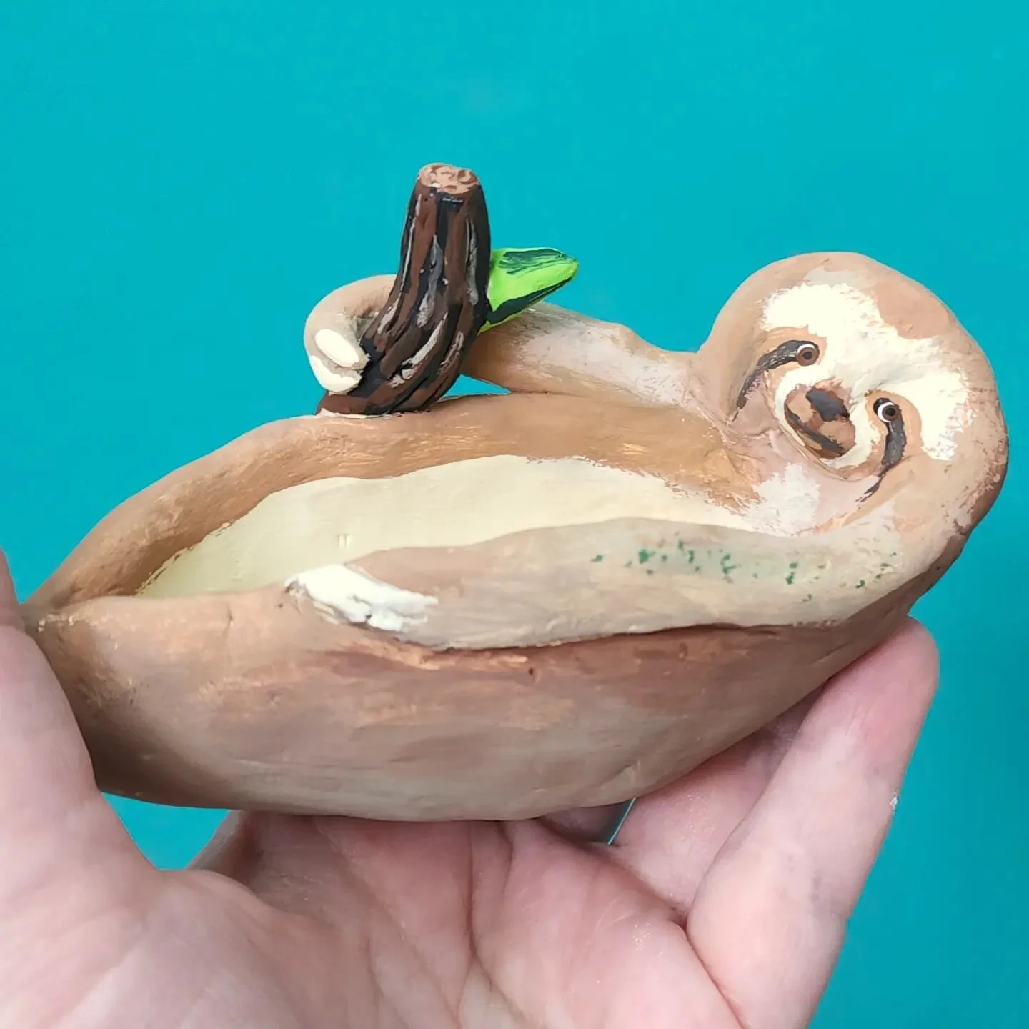 I made a small sloth pot at @viridianartstudios today. You should check them out.