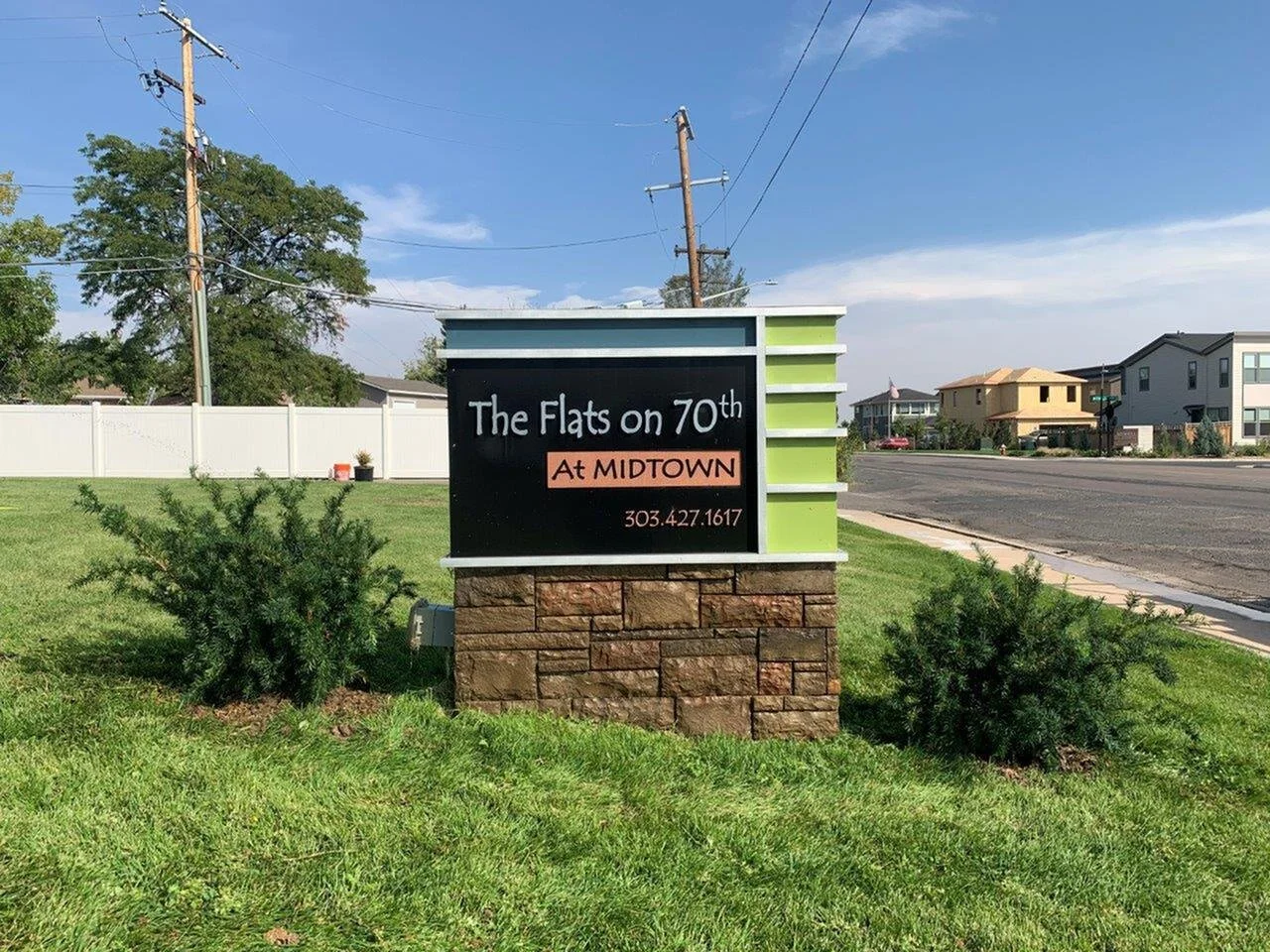 Monument Sign with Bushes.jpg